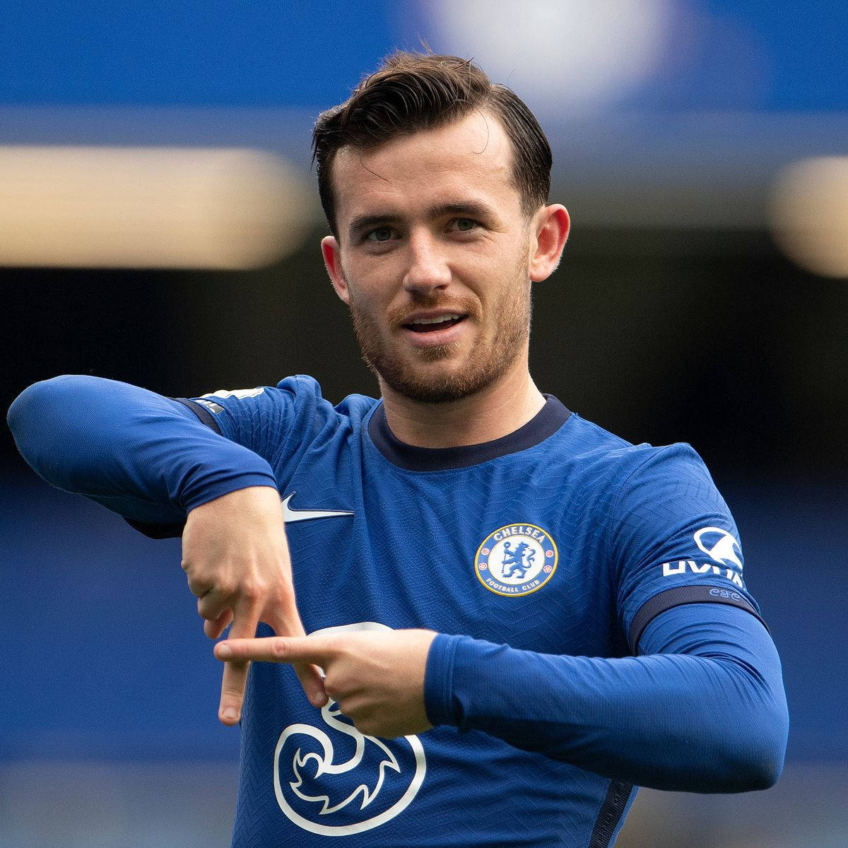 Ben Chilwell With A Hand Sign Background