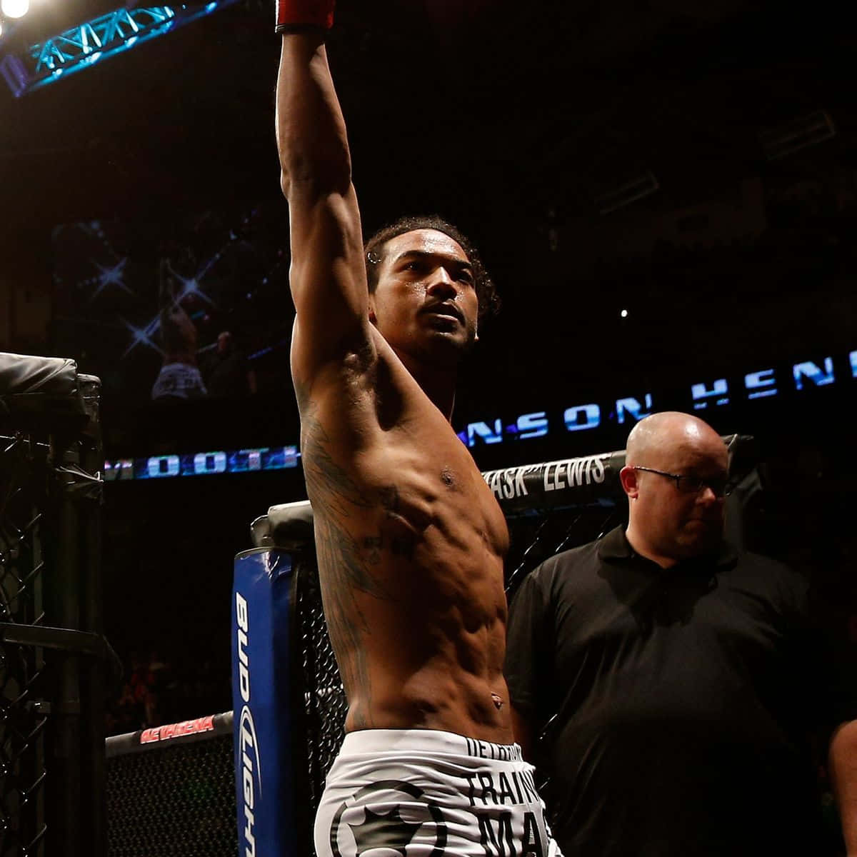 Ben Henderson In Triumphant Pose Post Victory Background