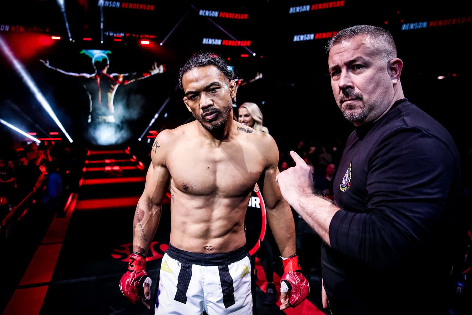 Ben Henderson Making A Dramatic Fight Entrance Background