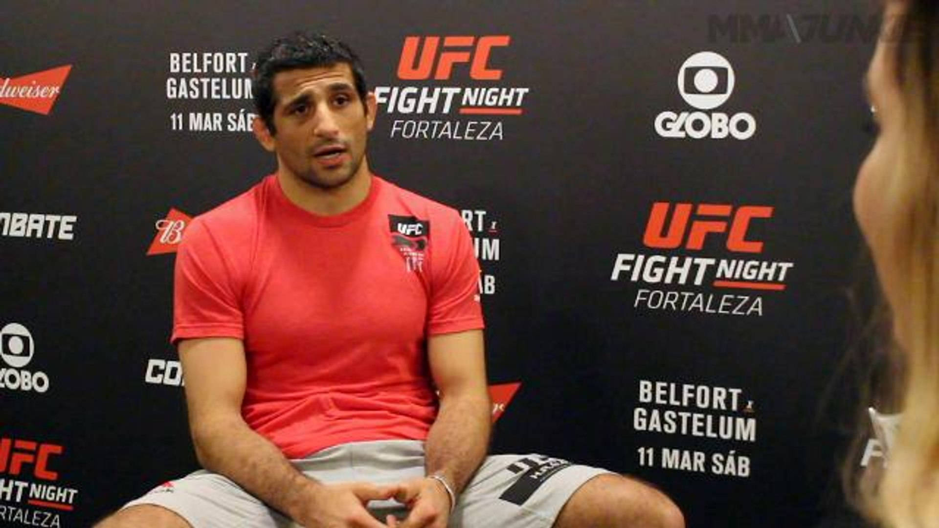 Beneil Dariush Engaged In An Interview Background