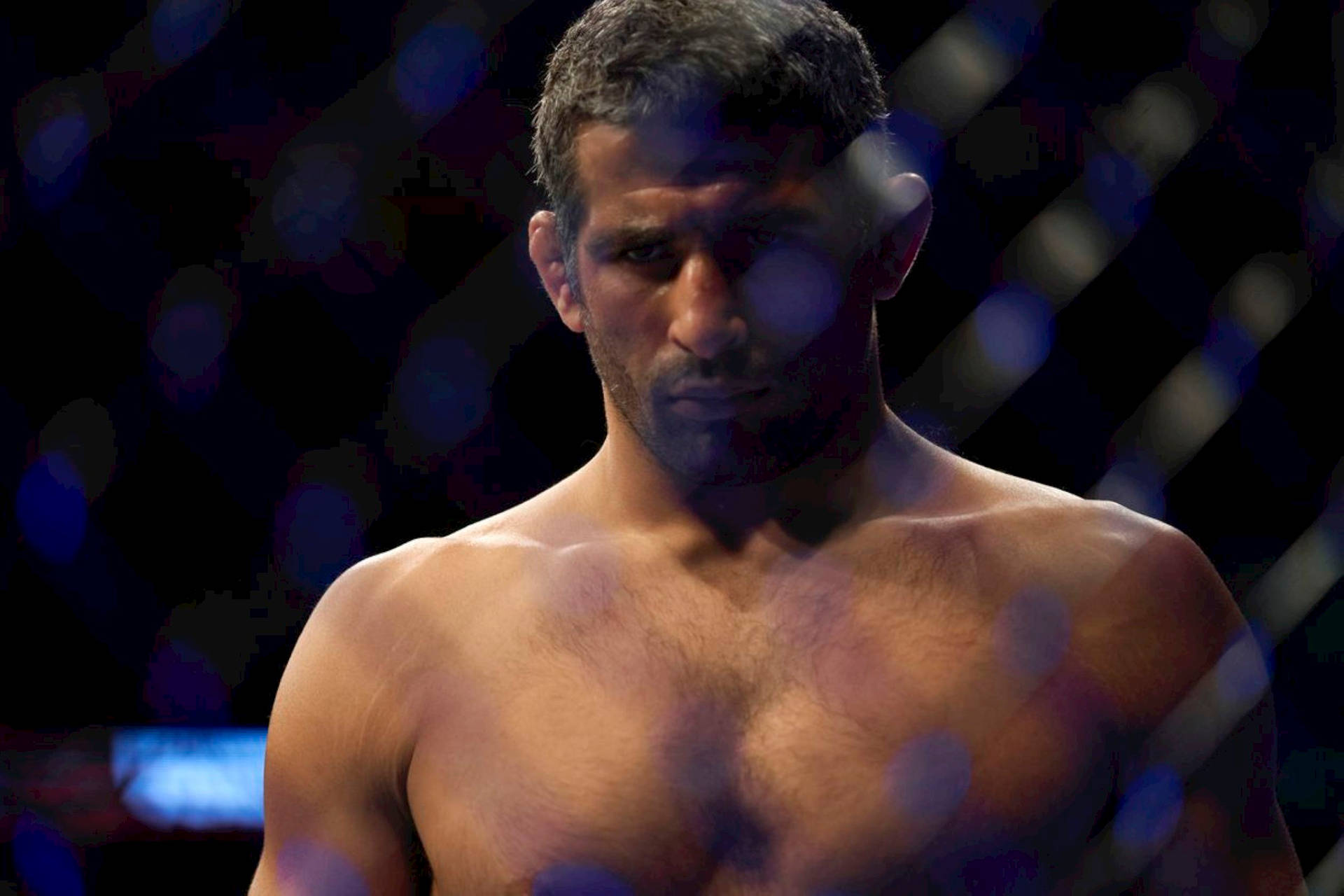 Beneil Dariush Focused In The Ring Background