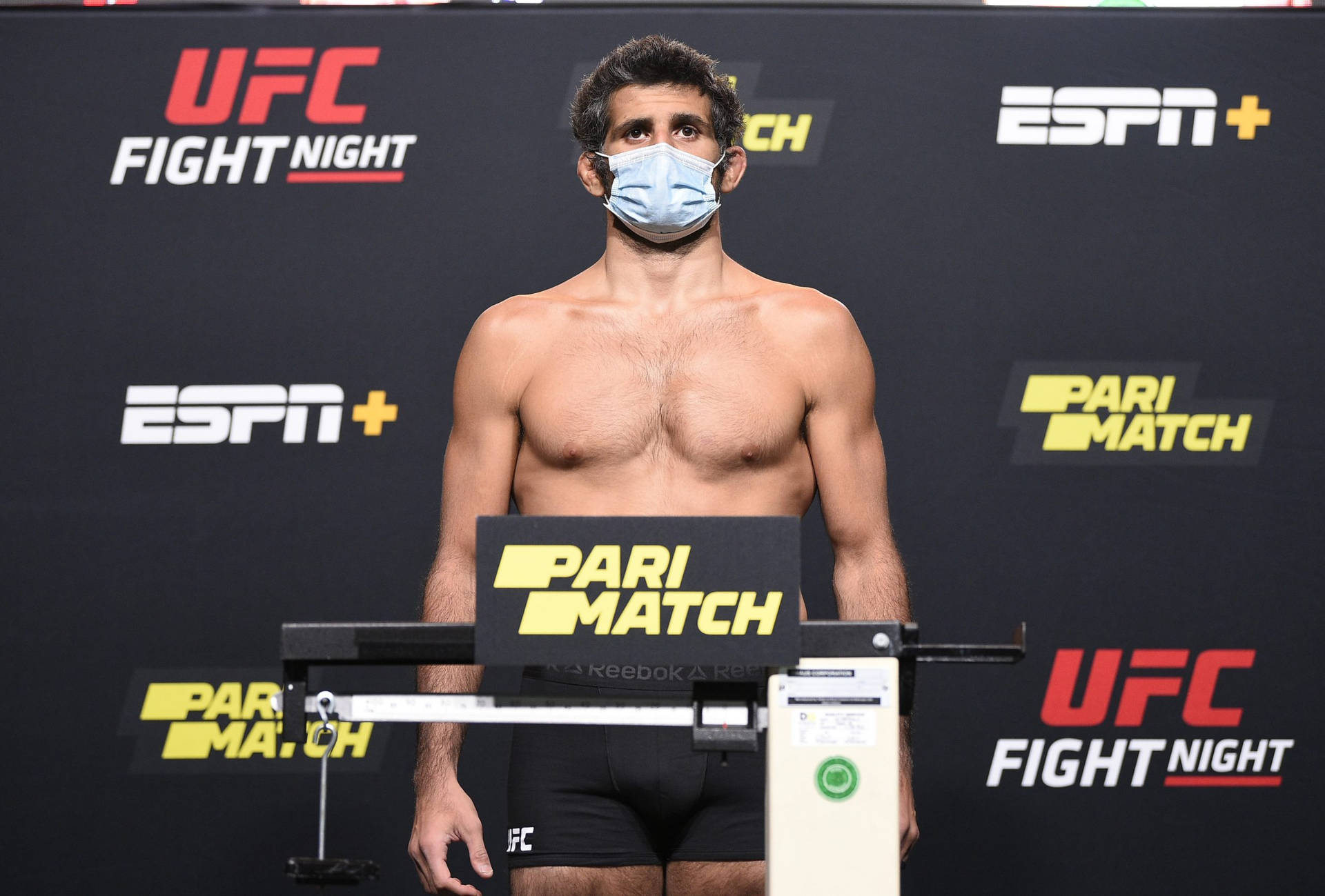 Beneil Dariush Wearing Face Mask Background