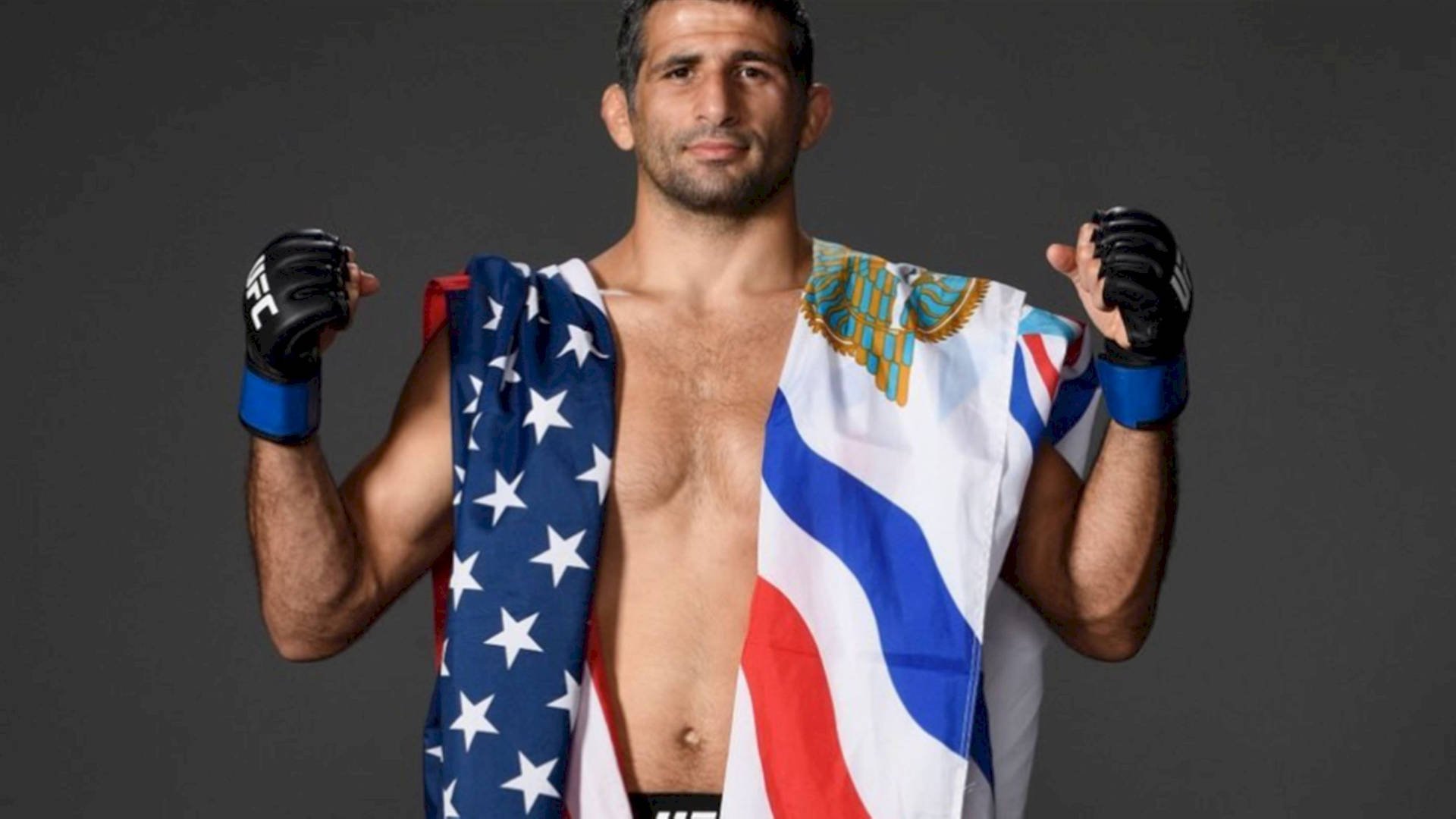 Beneil Dariush With Two Flags Background