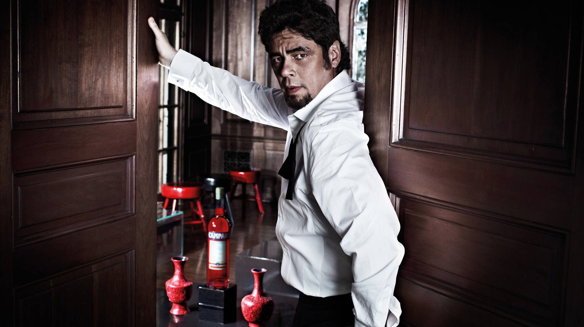 Benicio Del Toro Captivating Stare In The October 2011 Campari Calendar Background