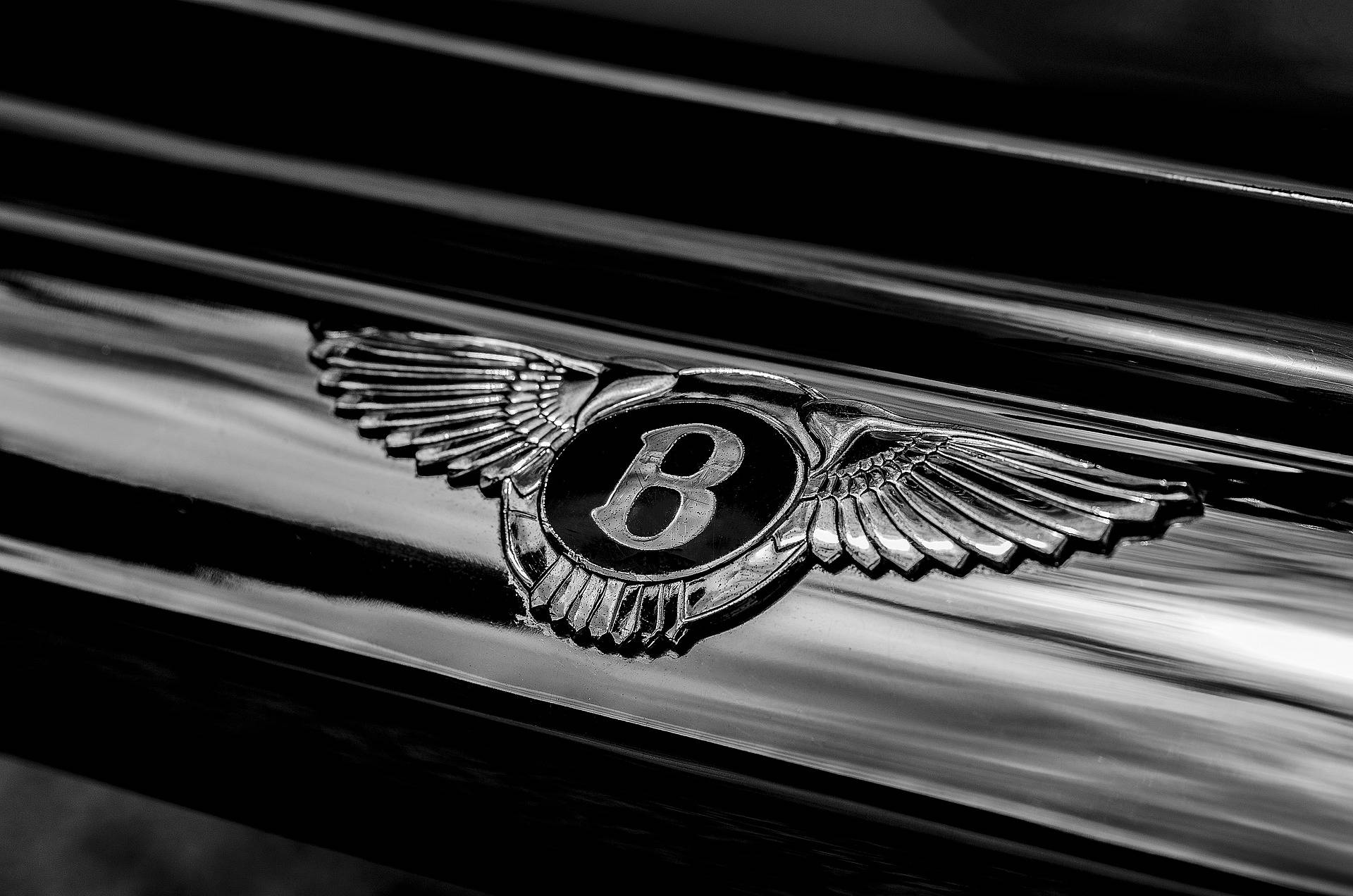 Bentley Cars Logo On Hood Background