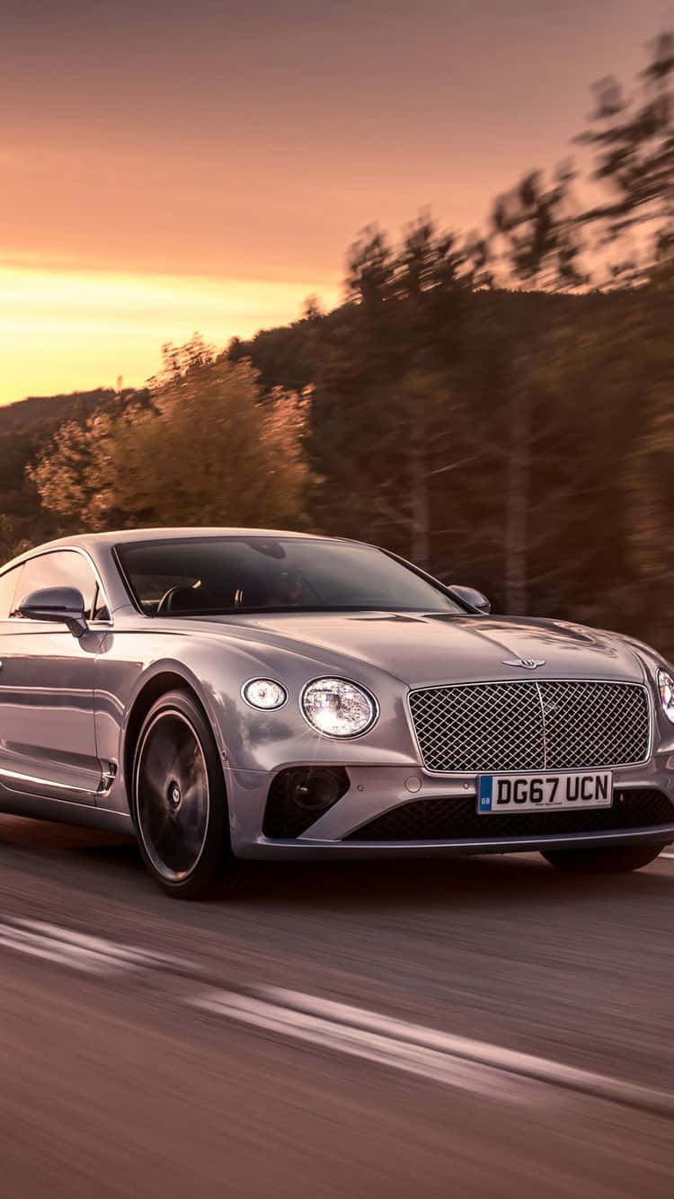 Bently Luxury Iphone On A Sleek Surface Background