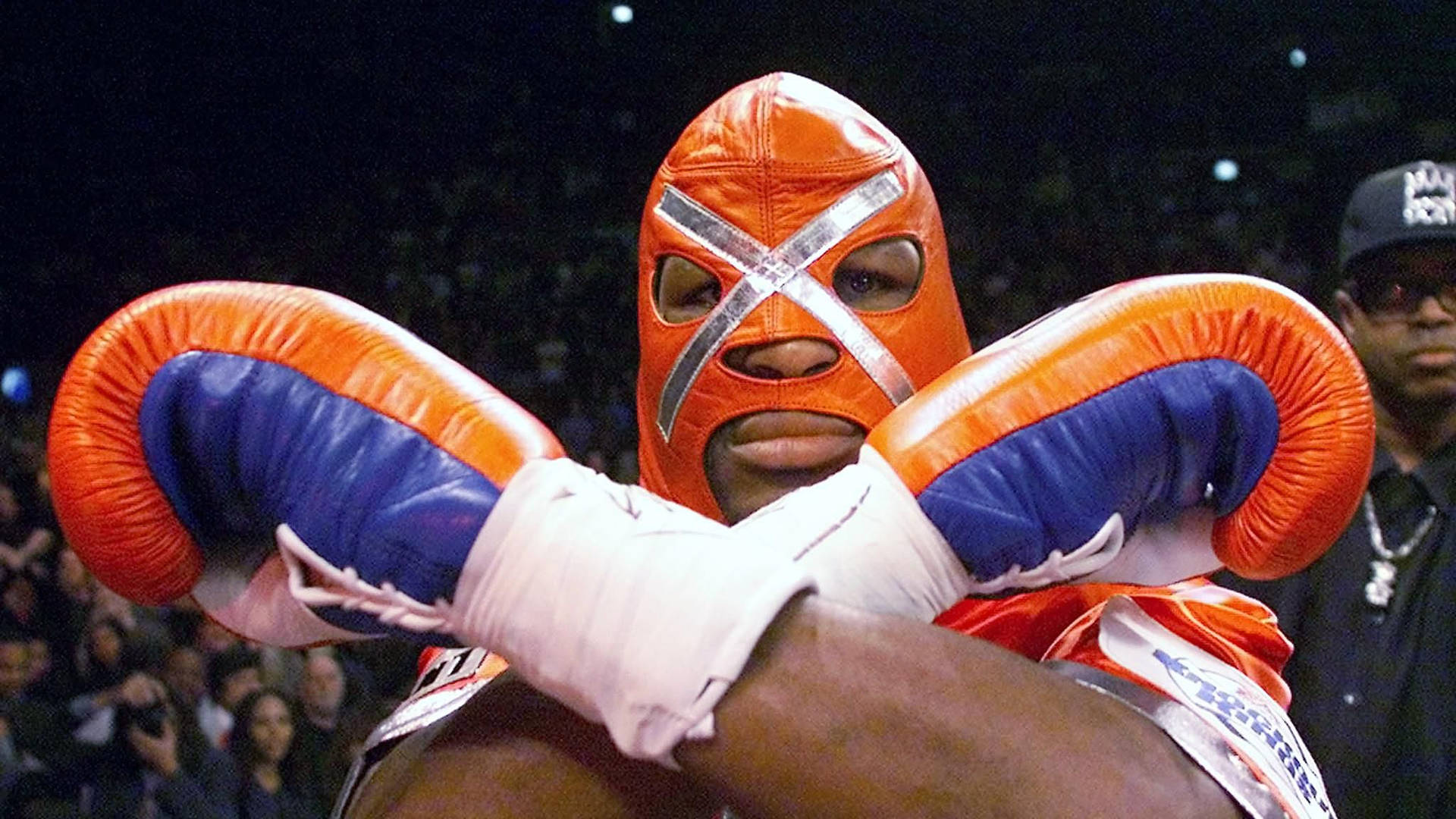 Bernard Hopkins Behind An Orange Mask Background