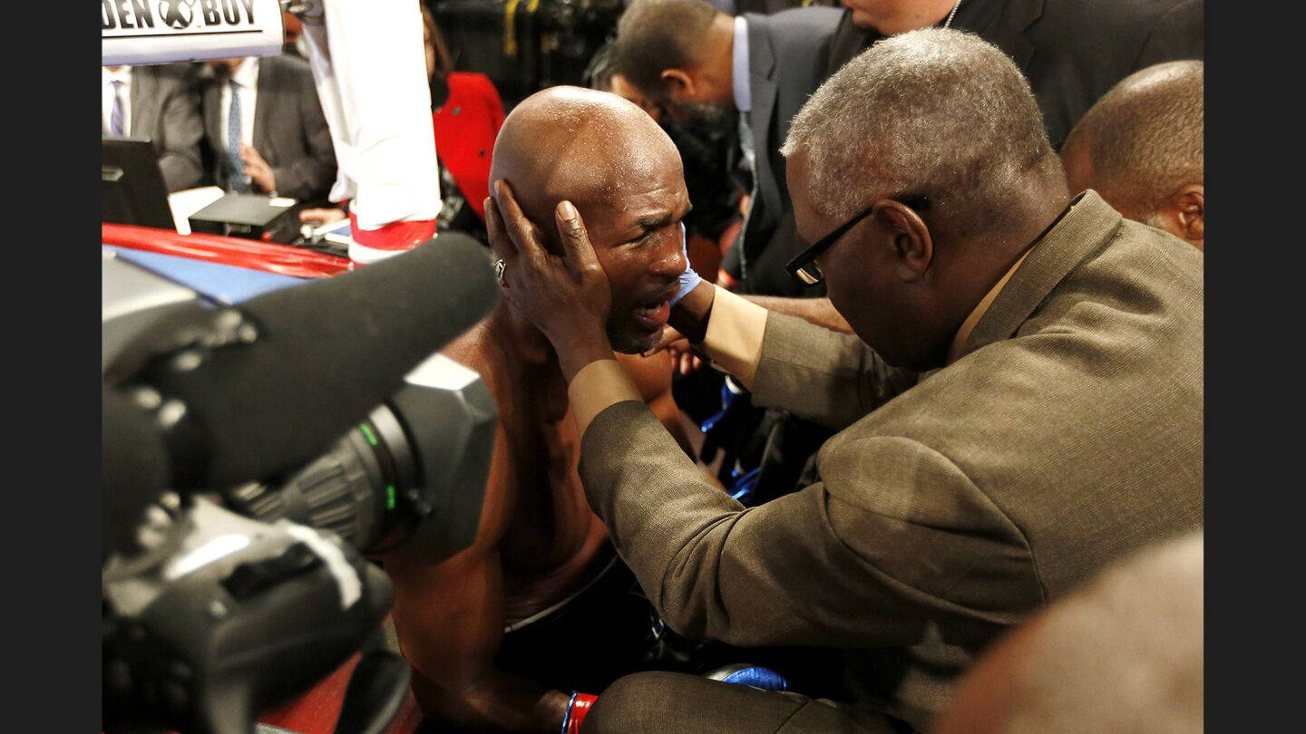 Bernard Hopkins Comforted By His Coach