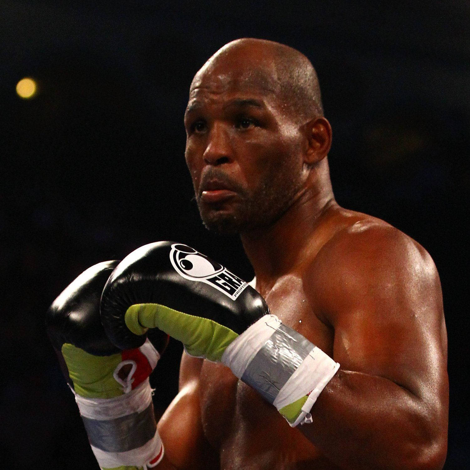 Bernard Hopkins In Black And Green Gloves Background