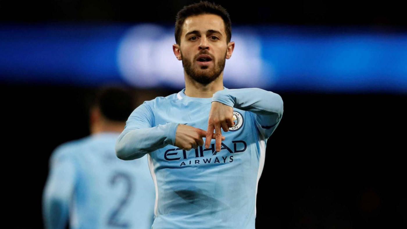 Bernardo Silva Forming A Symbol With His Fingers Background