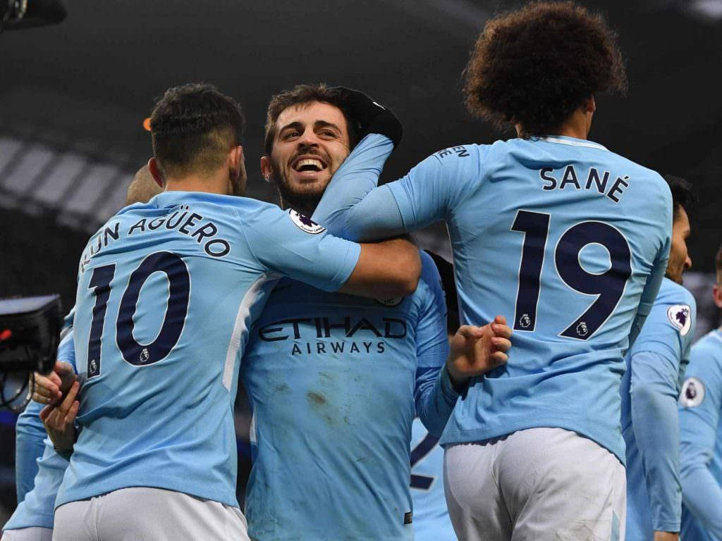 Bernardo Silva Hugging His Teammates Background