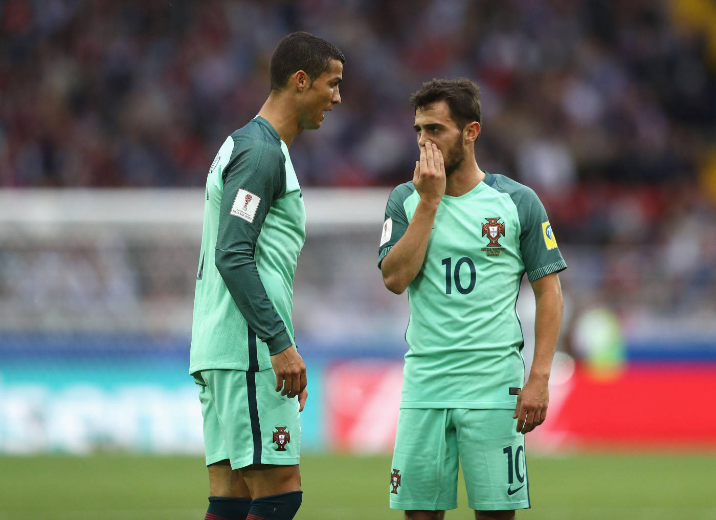 Bernardo Silva In Teal Talking To Teammate