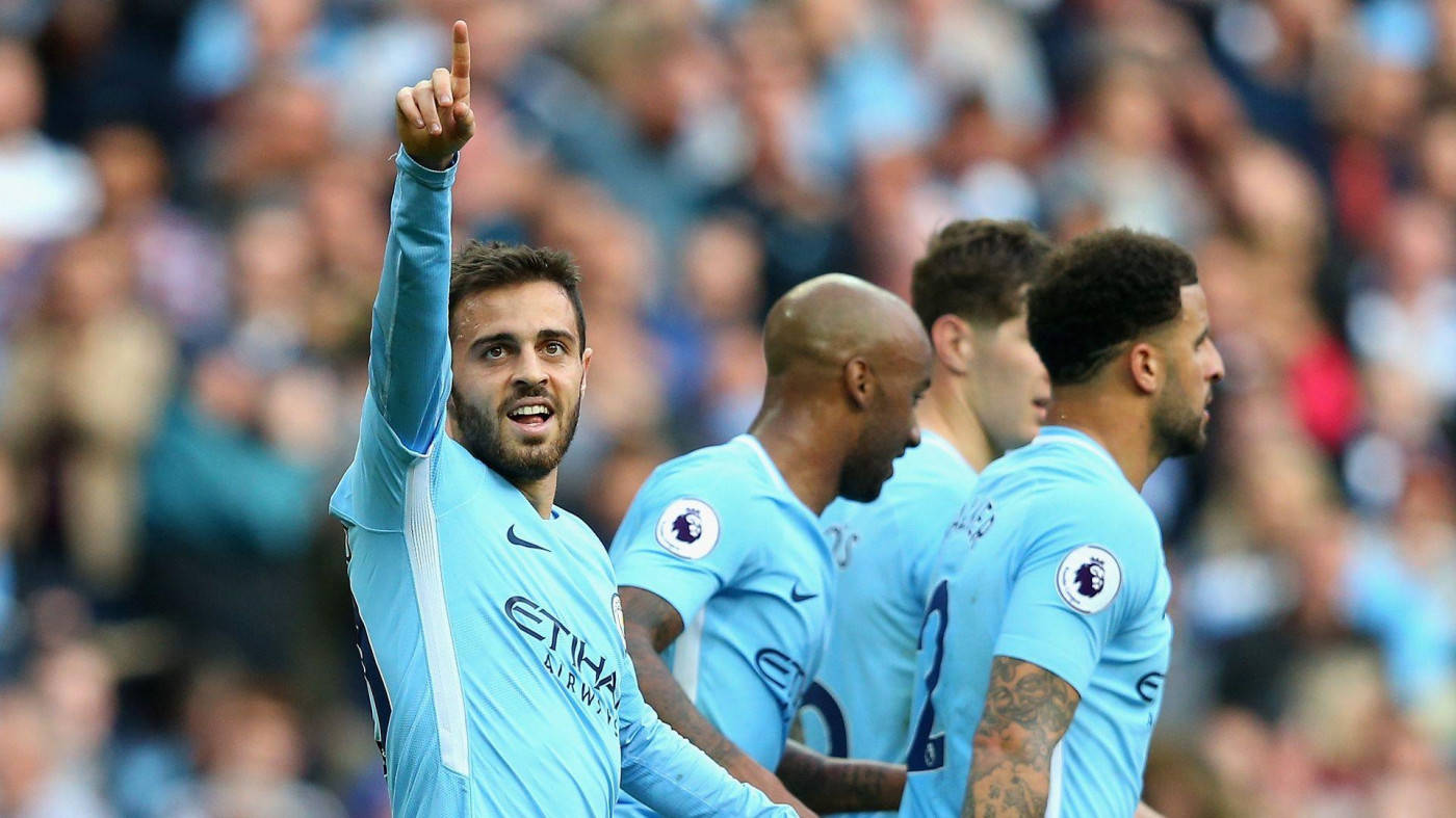 Bernardo Silva Pointing At The Sky Triumphantly Background