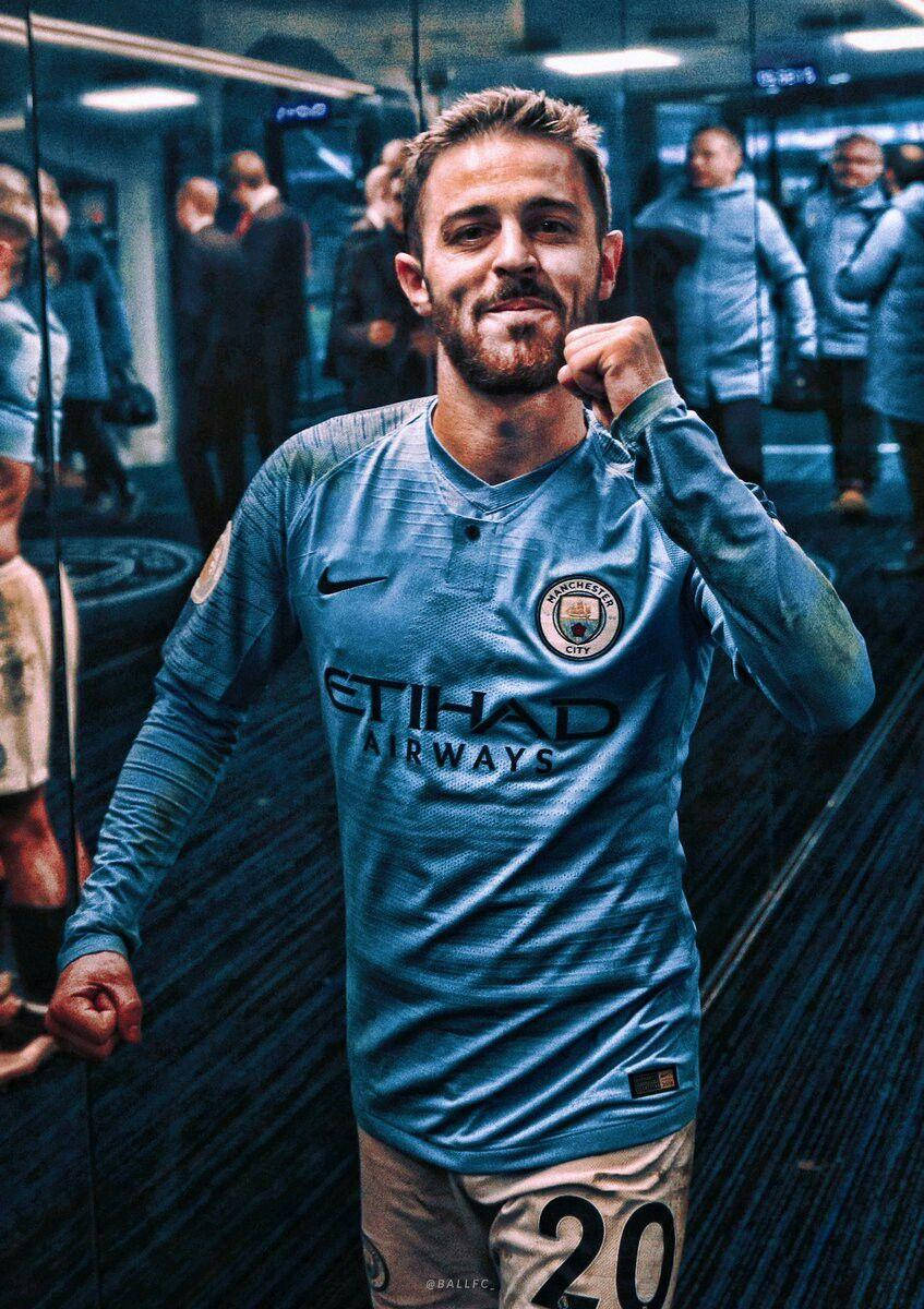 Bernardo Silva With One Fist Raised Triumphantly Background