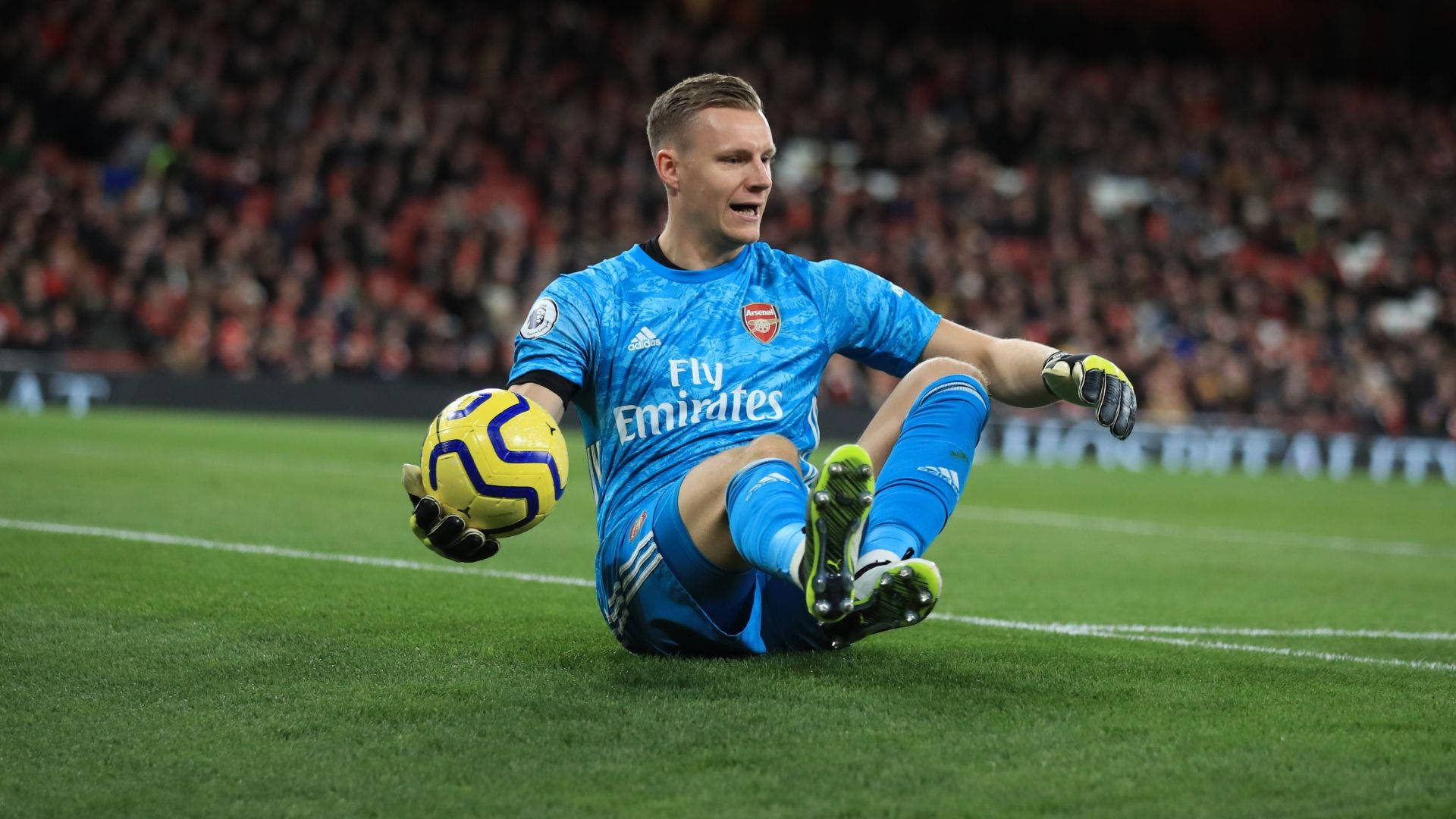 Bernd Leno Sitting On The Field Background