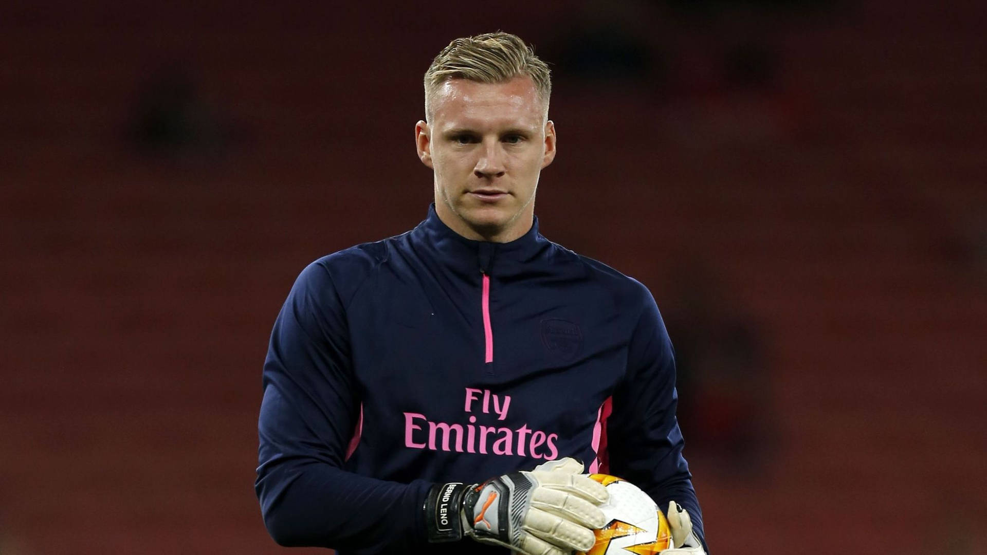 Bernd Leno With A Serious Expression Background