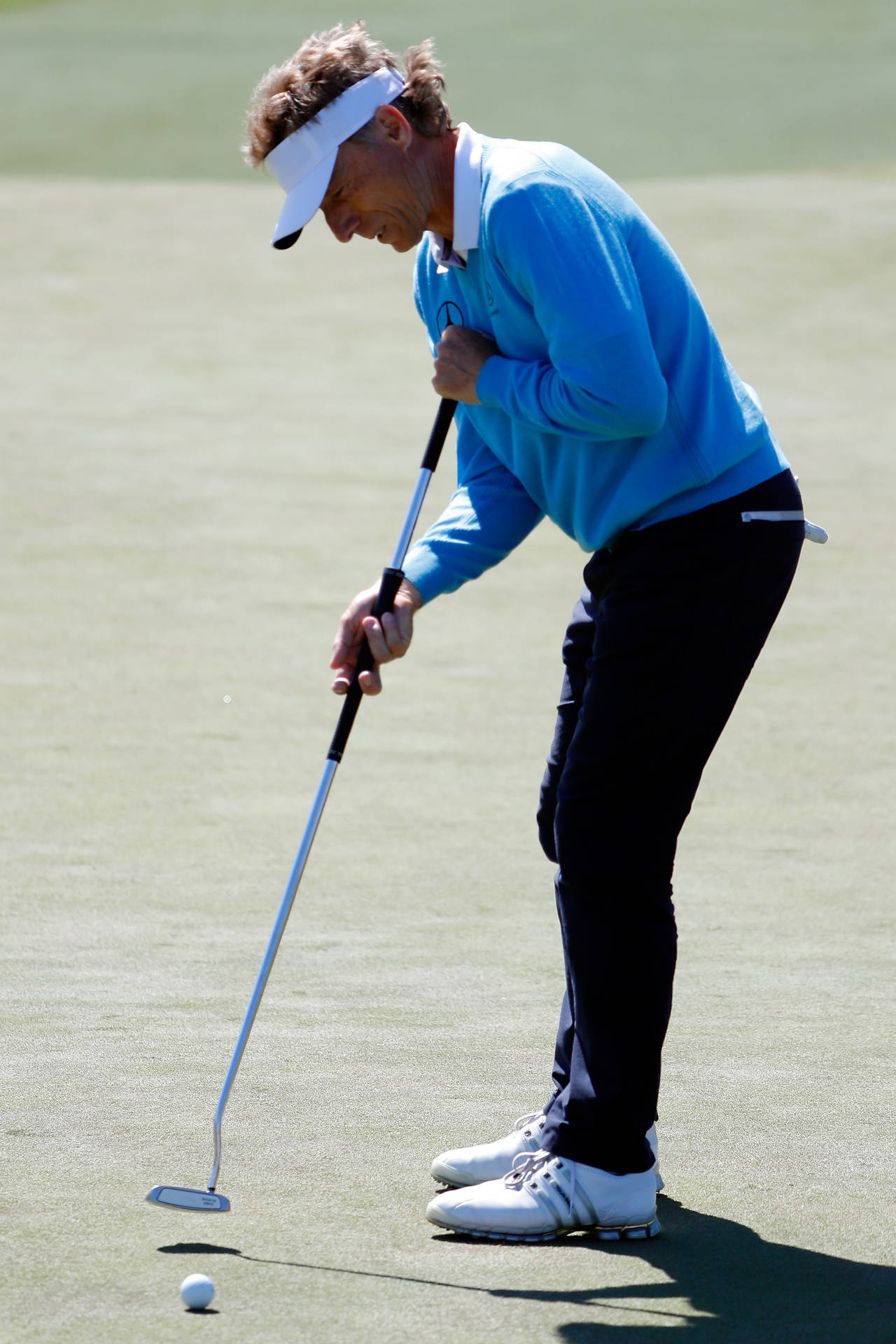 Bernhard Langer About To Hit The Ball Background