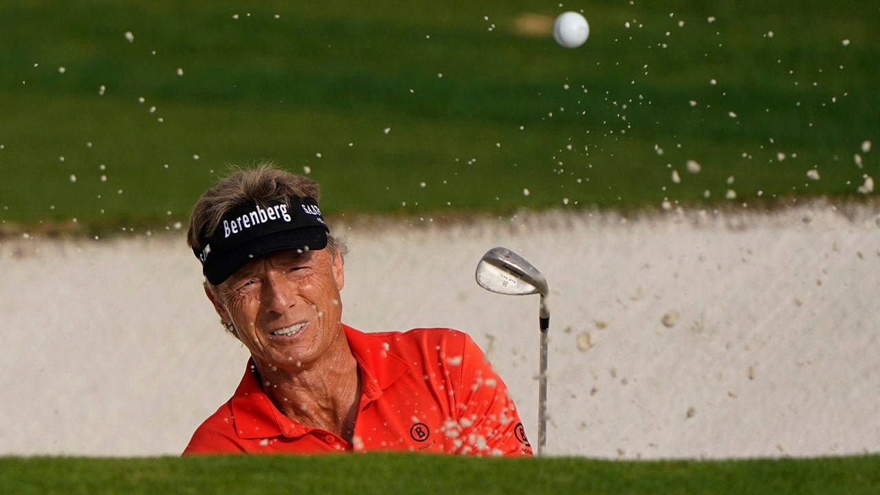 Bernhard Langer Looking At Ball Background