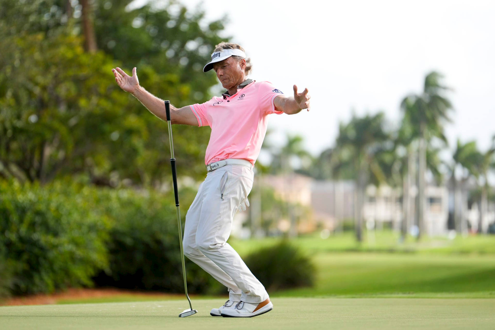 Bernhard Langer Standing On Golf Course Background