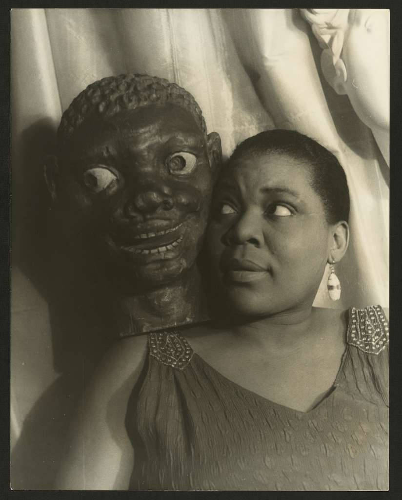 Bessie Smith Beside A Bust