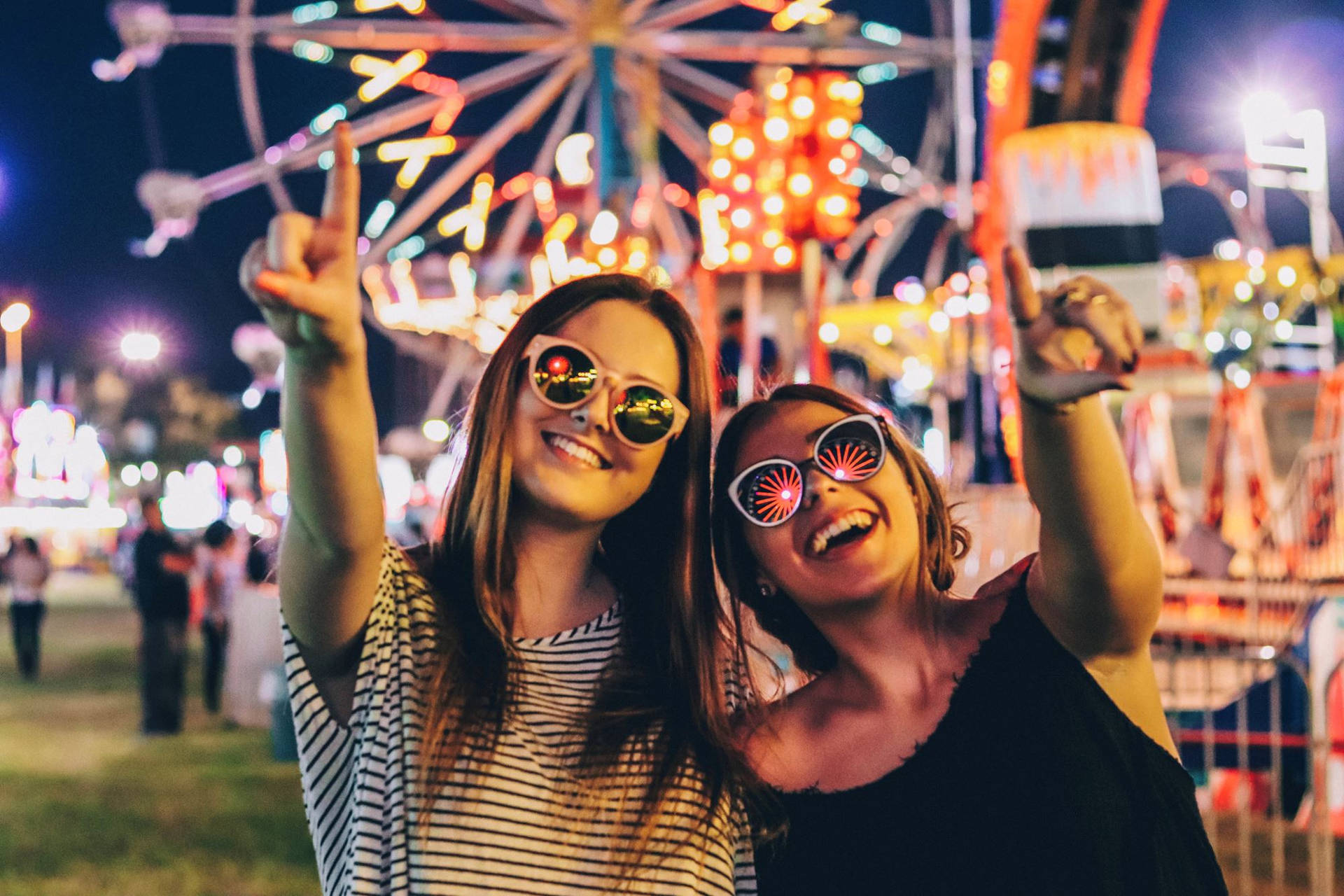 Best Friends Enjoying The Fair Background