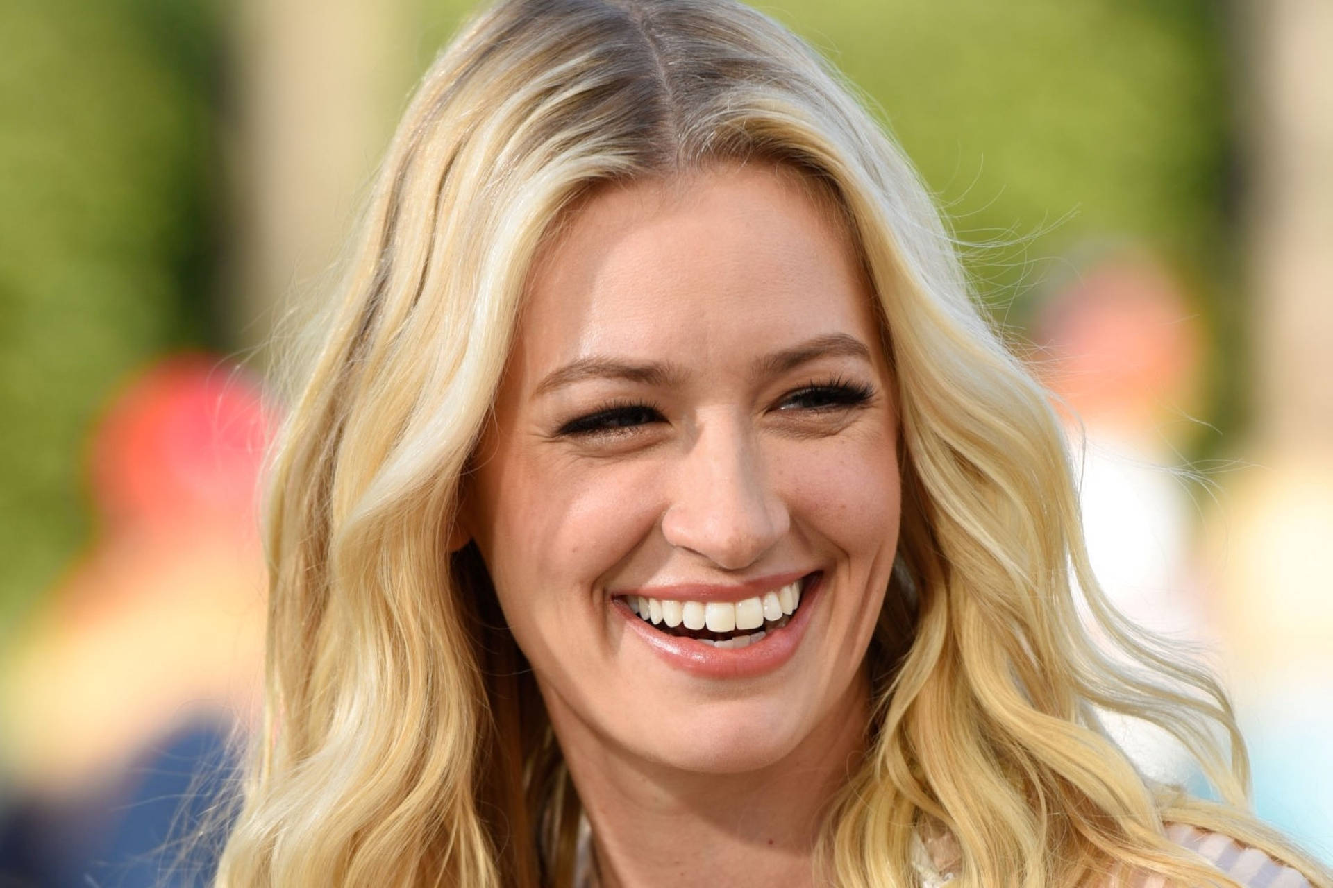 Beth Behrs Lovely Smile Background