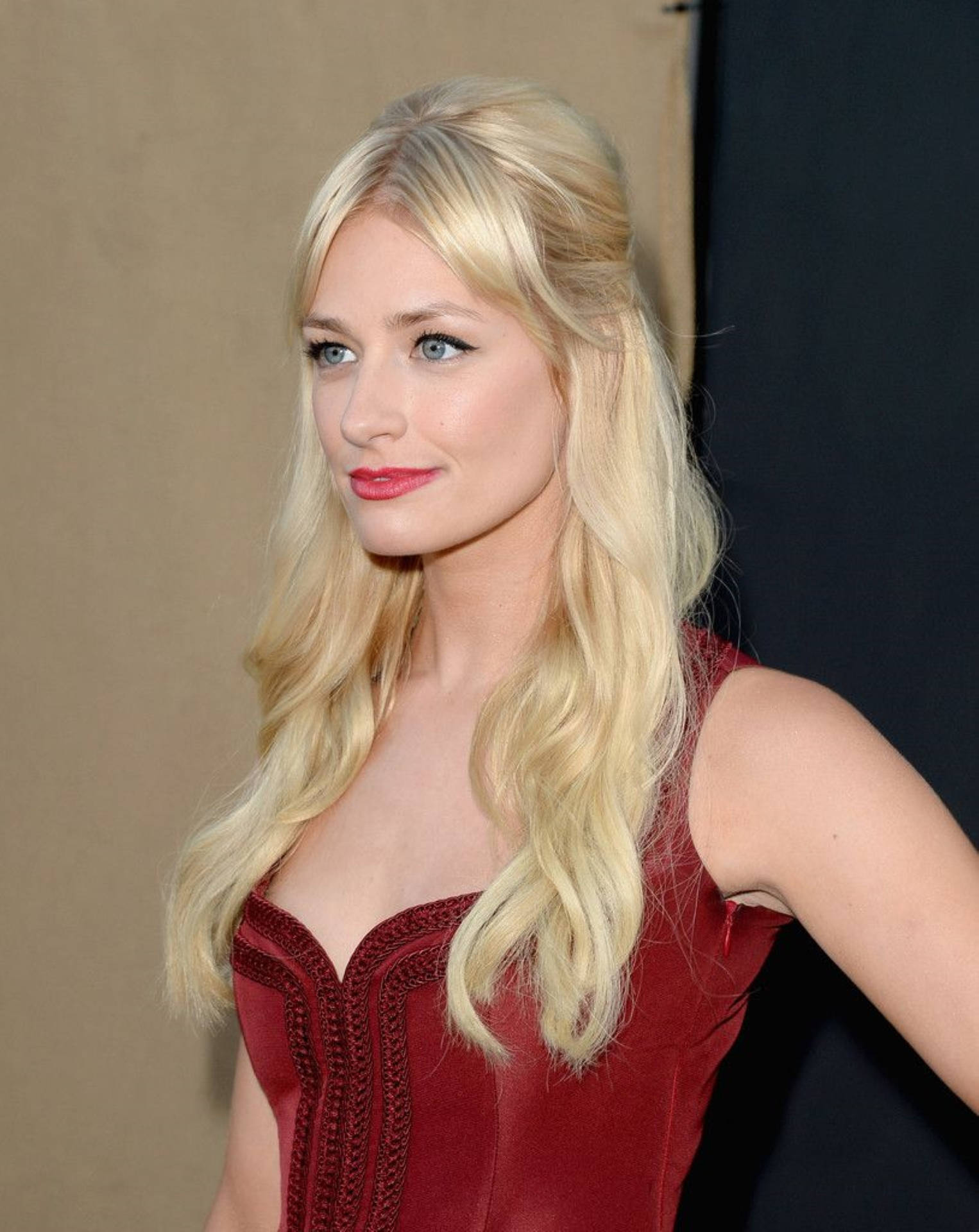 Beth Behrs Sexy In Red Background