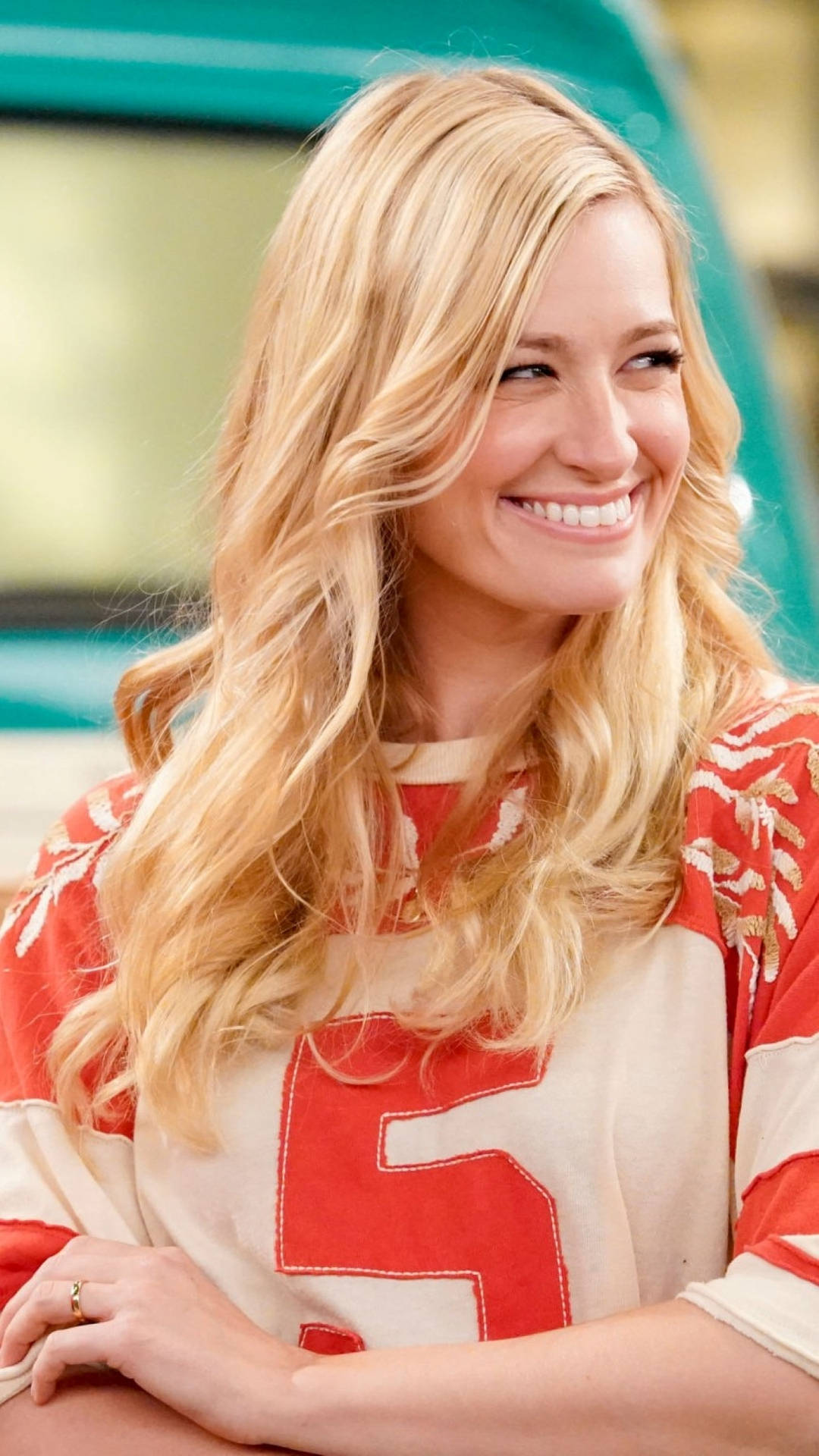 Beth Behrs Silly Smile Background