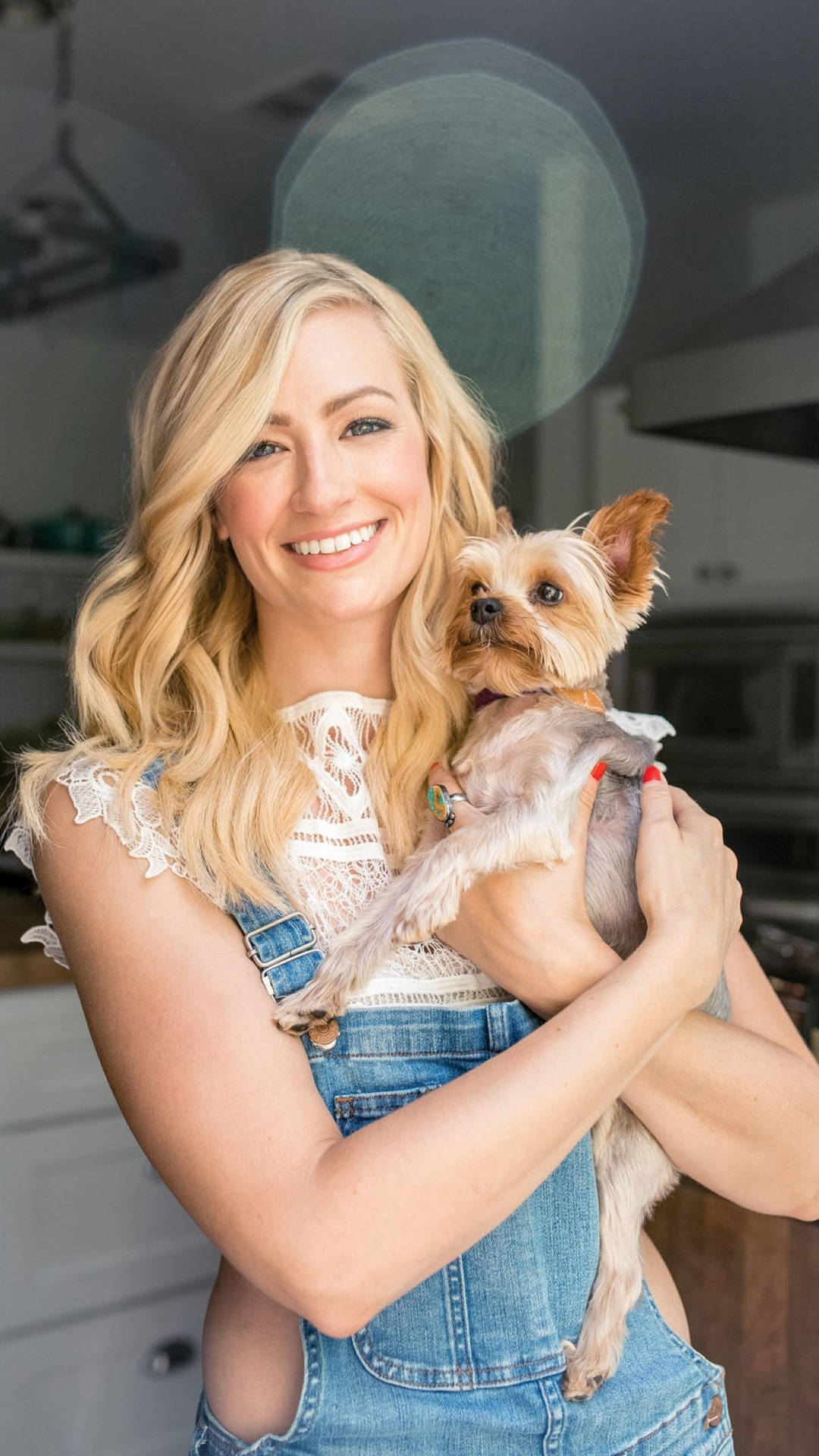 Beth Behrs With Puppy Background