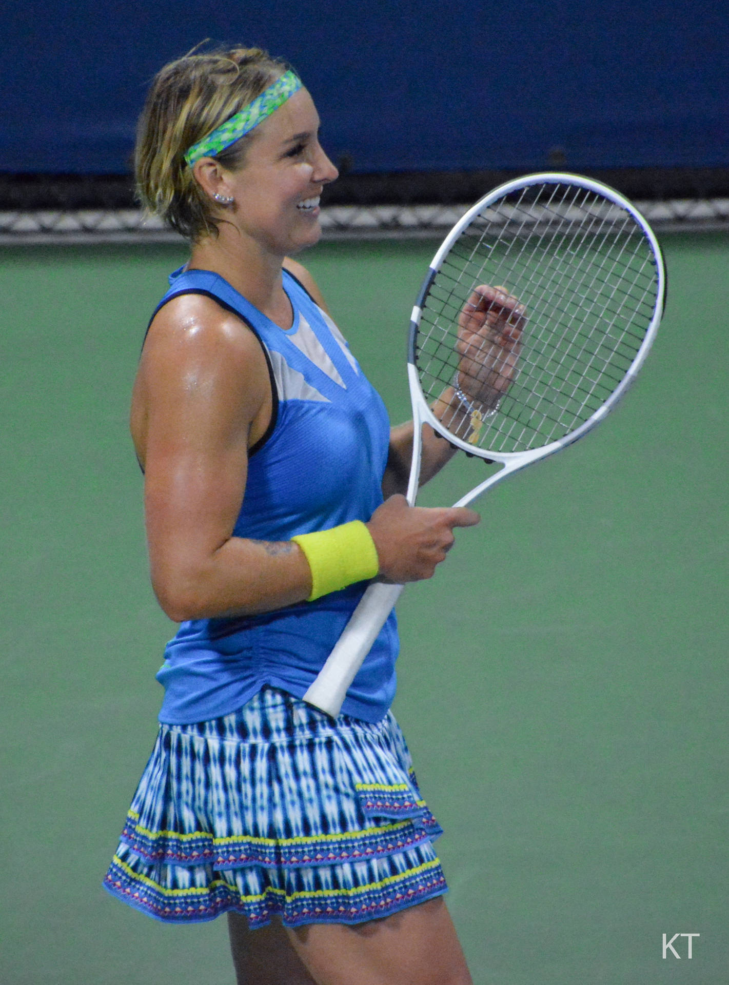 Bethanie Mattek-sands Holding Tennis Racket Background