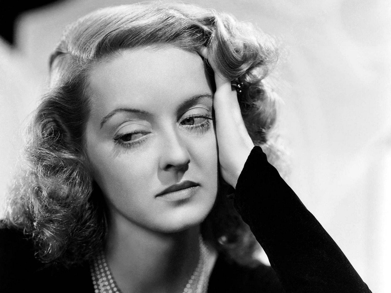 Bette Davis With Serious Face Background