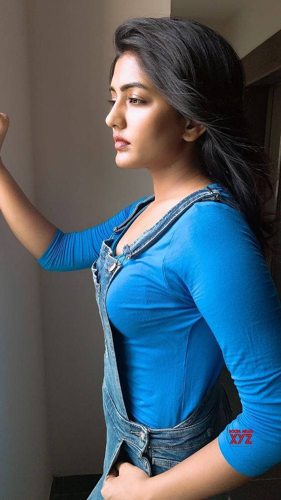 Bhojpuri Star Wearing Blue Top Background