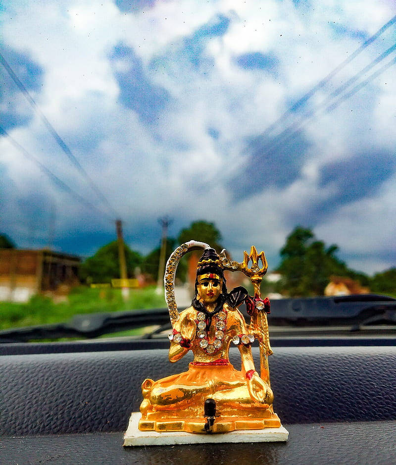 Bhole Baba Gold Figurine Background