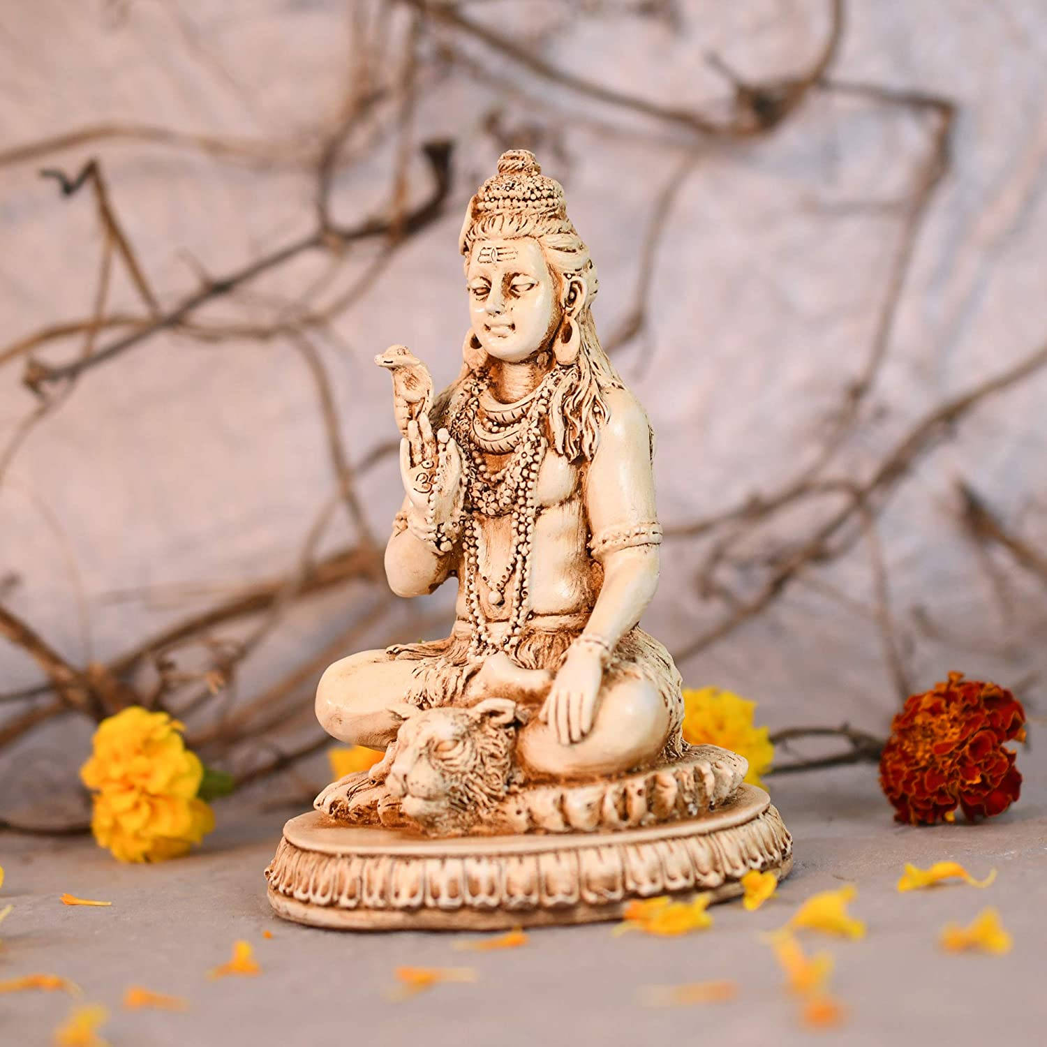 Bholenath Hd Shiva Figurine With Dried Flowers Background
