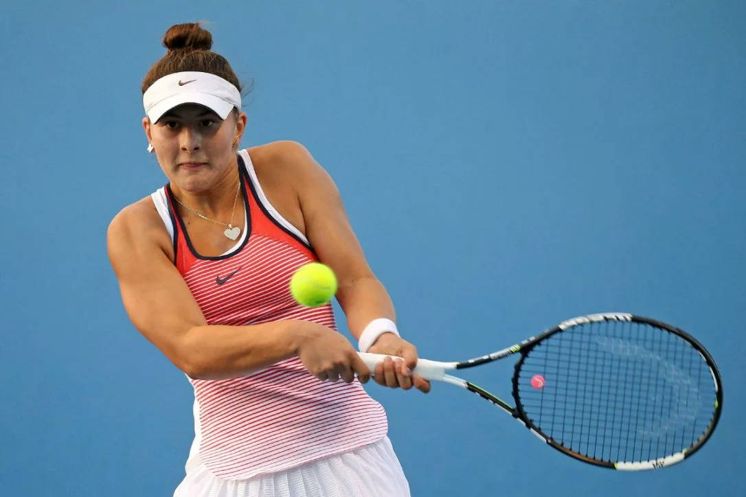 Bianca Andreescu And Approaching Tennis Ball Background