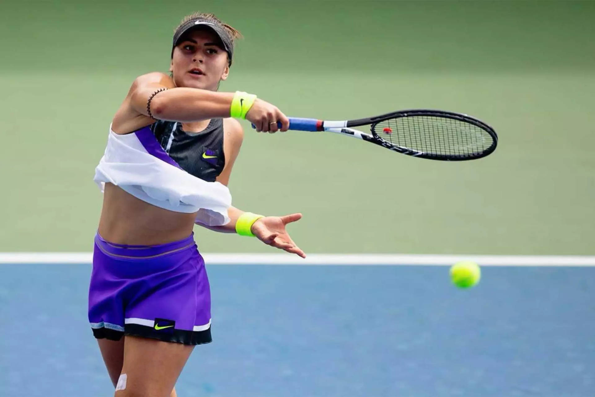 Bianca Andreescu Hitting The Ball Background