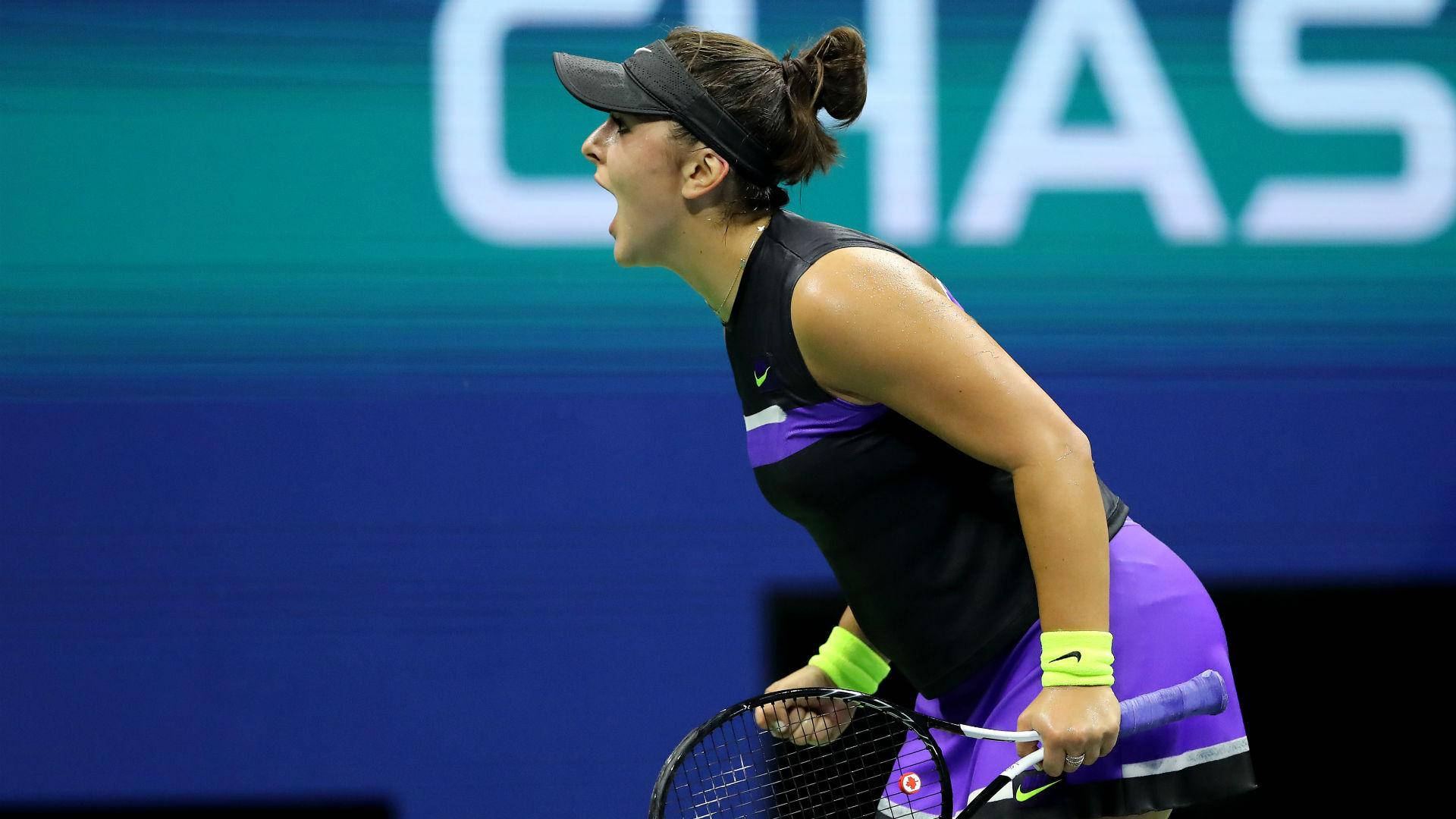 Bianca Andreescu In Action: Expressing Power And Determination On The Tennis Court Background