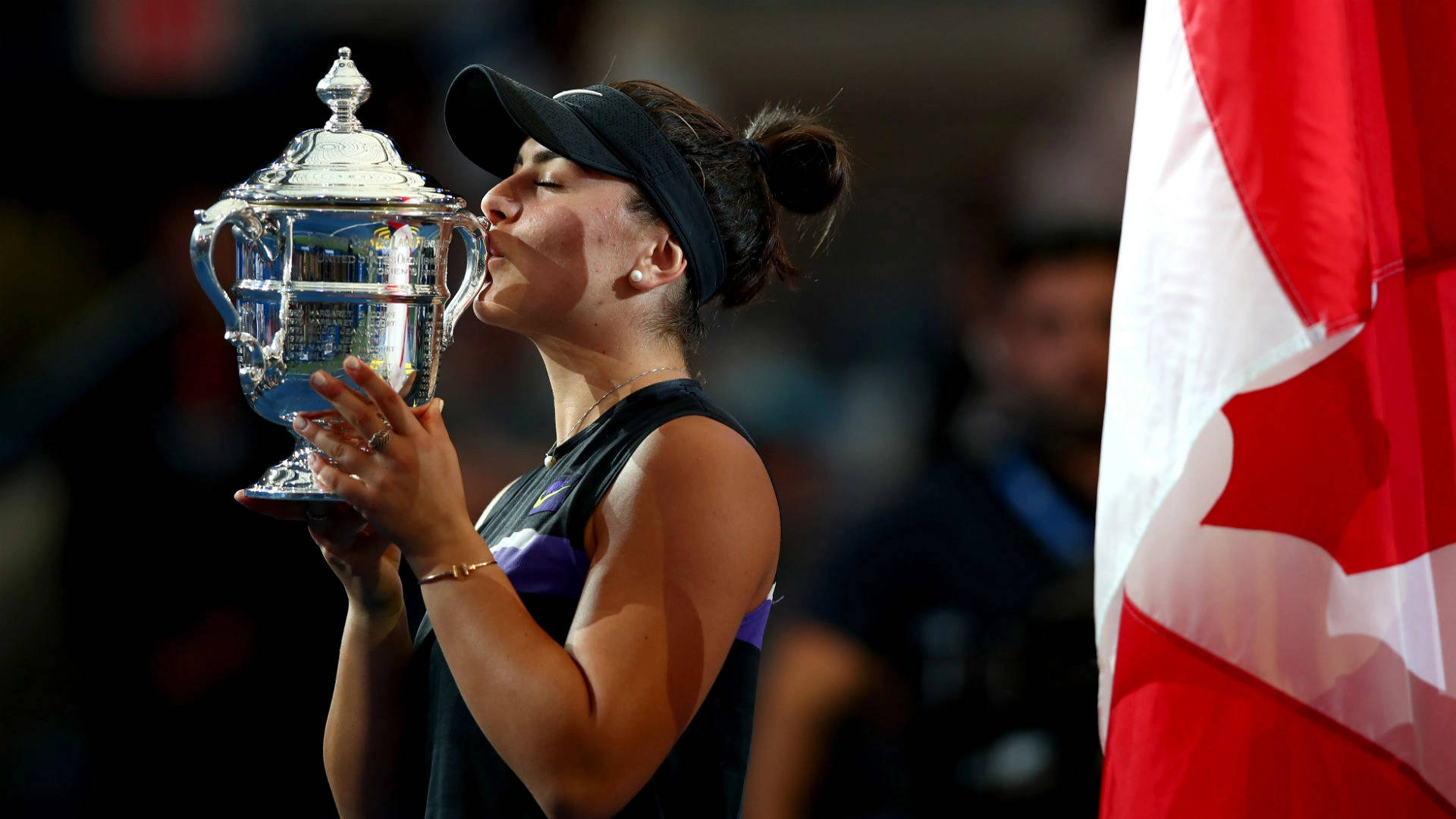 Bianca Andreescu Kissing Silver Trophy Background