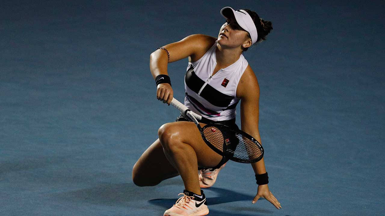 Bianca Andreescu Triumphantly Celebrating On Tennis Court Background