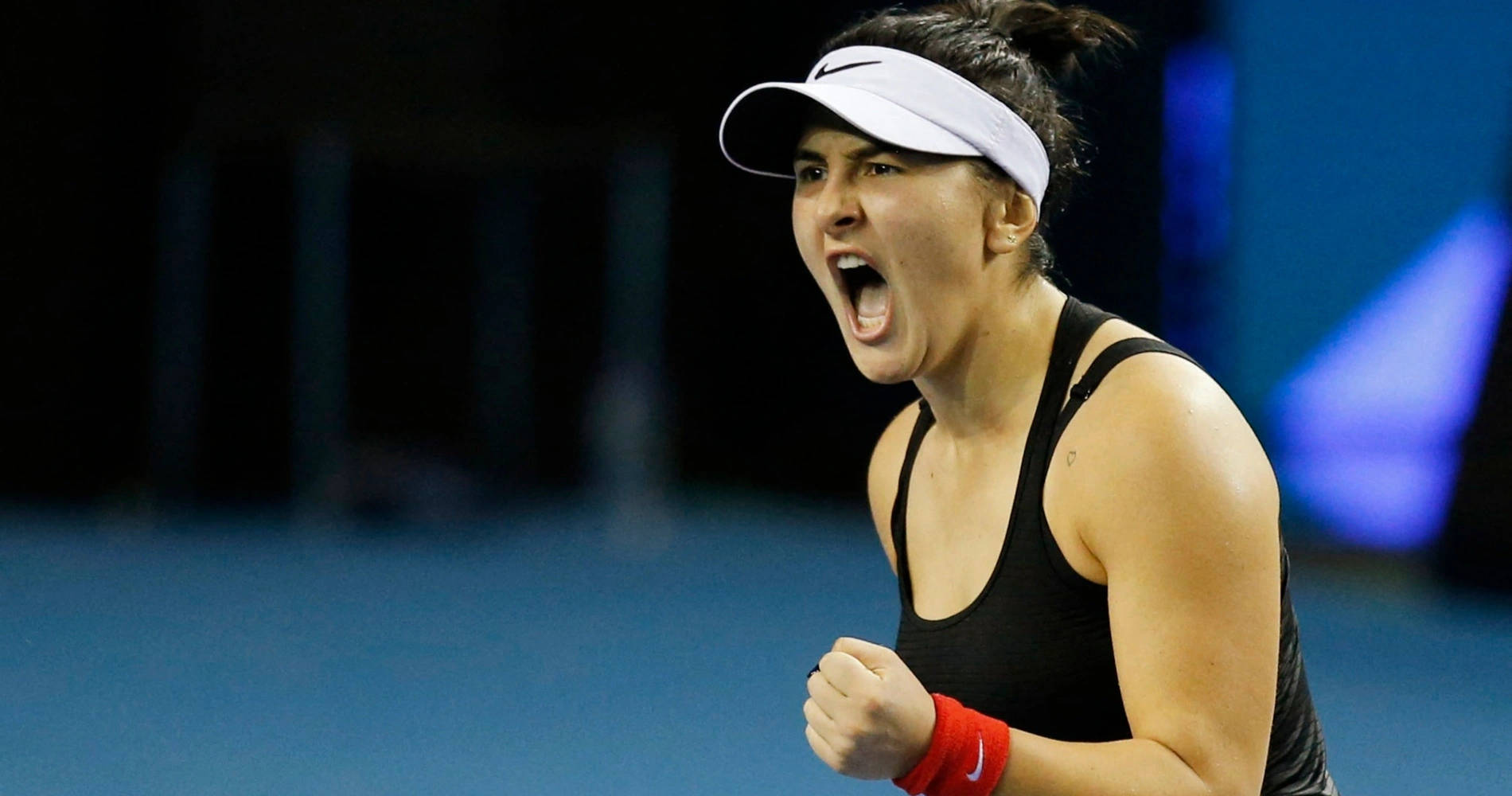 Bianca Andreescu Wearing White Visor Background