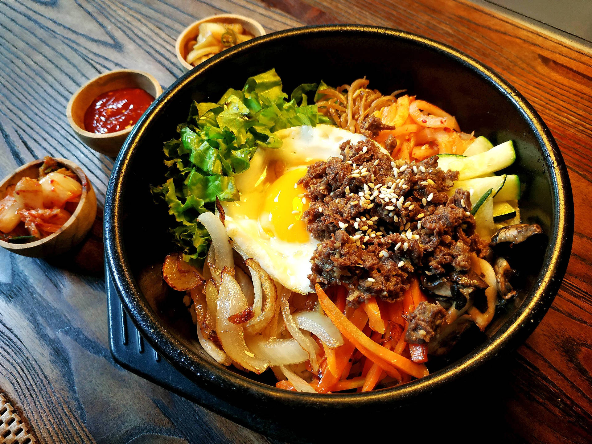 Bibimbap In A Cast Iron Bowl Background