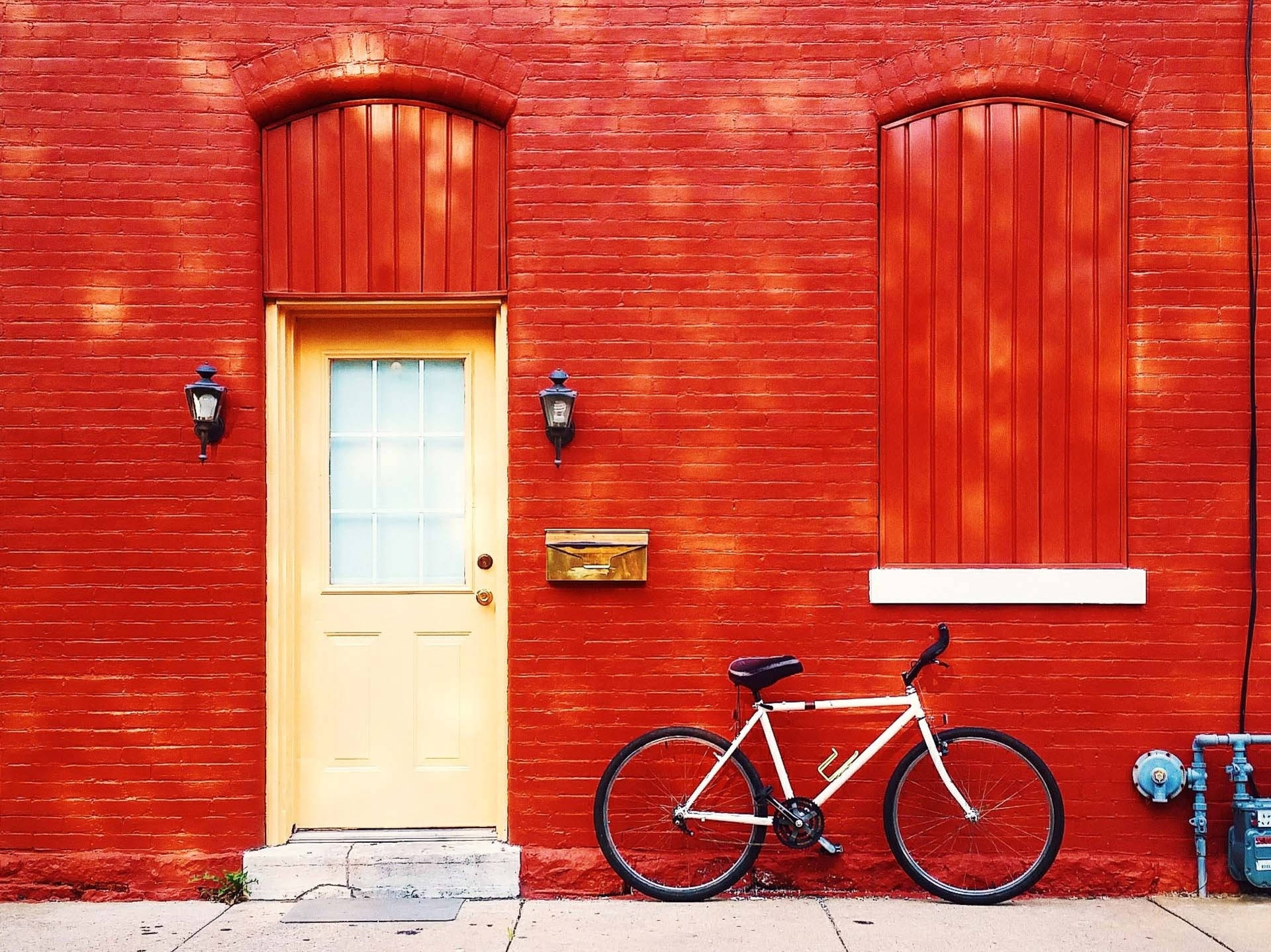 Bicycle On Red Brick Façade