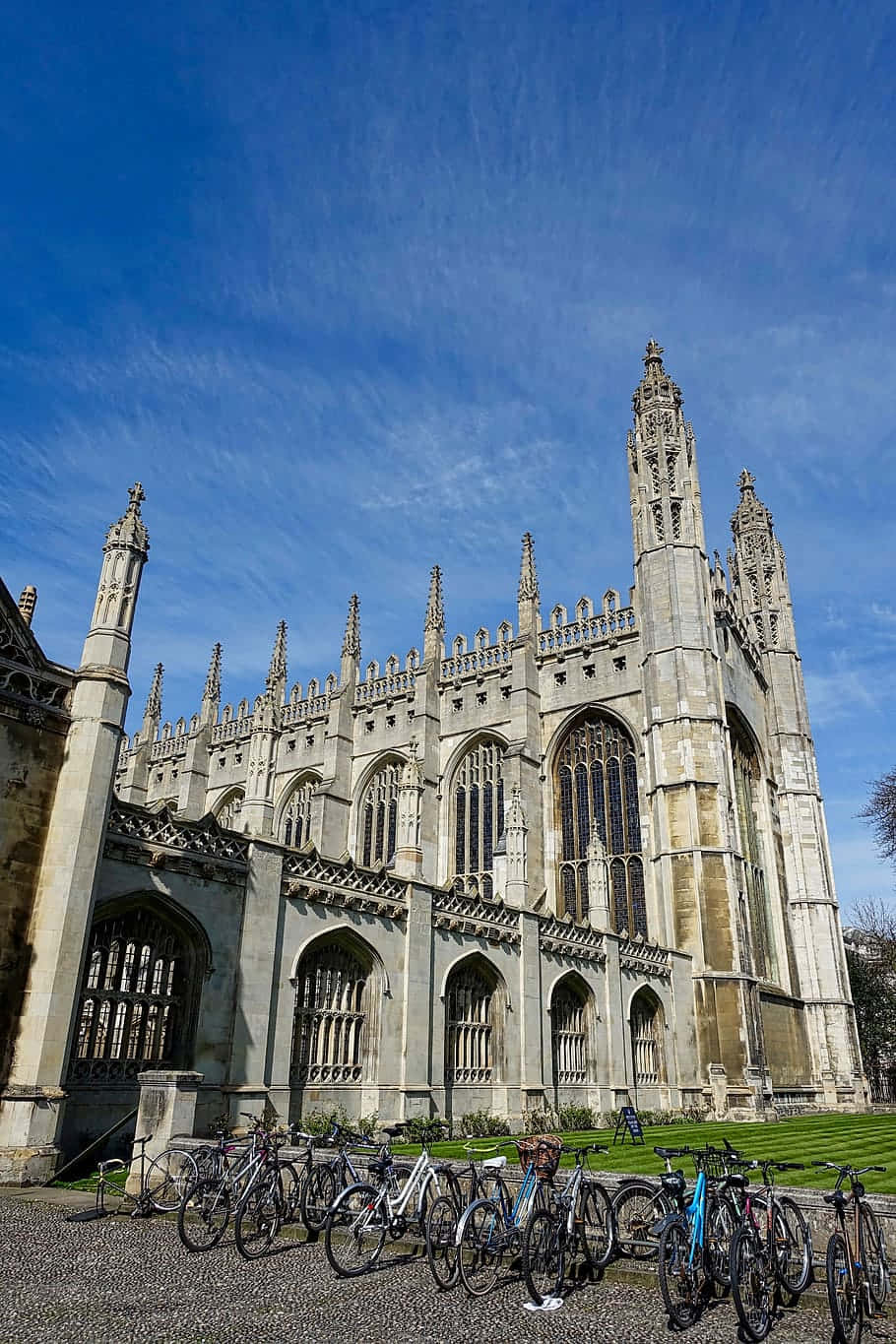 Bicycles Parked In Cambridge University Background