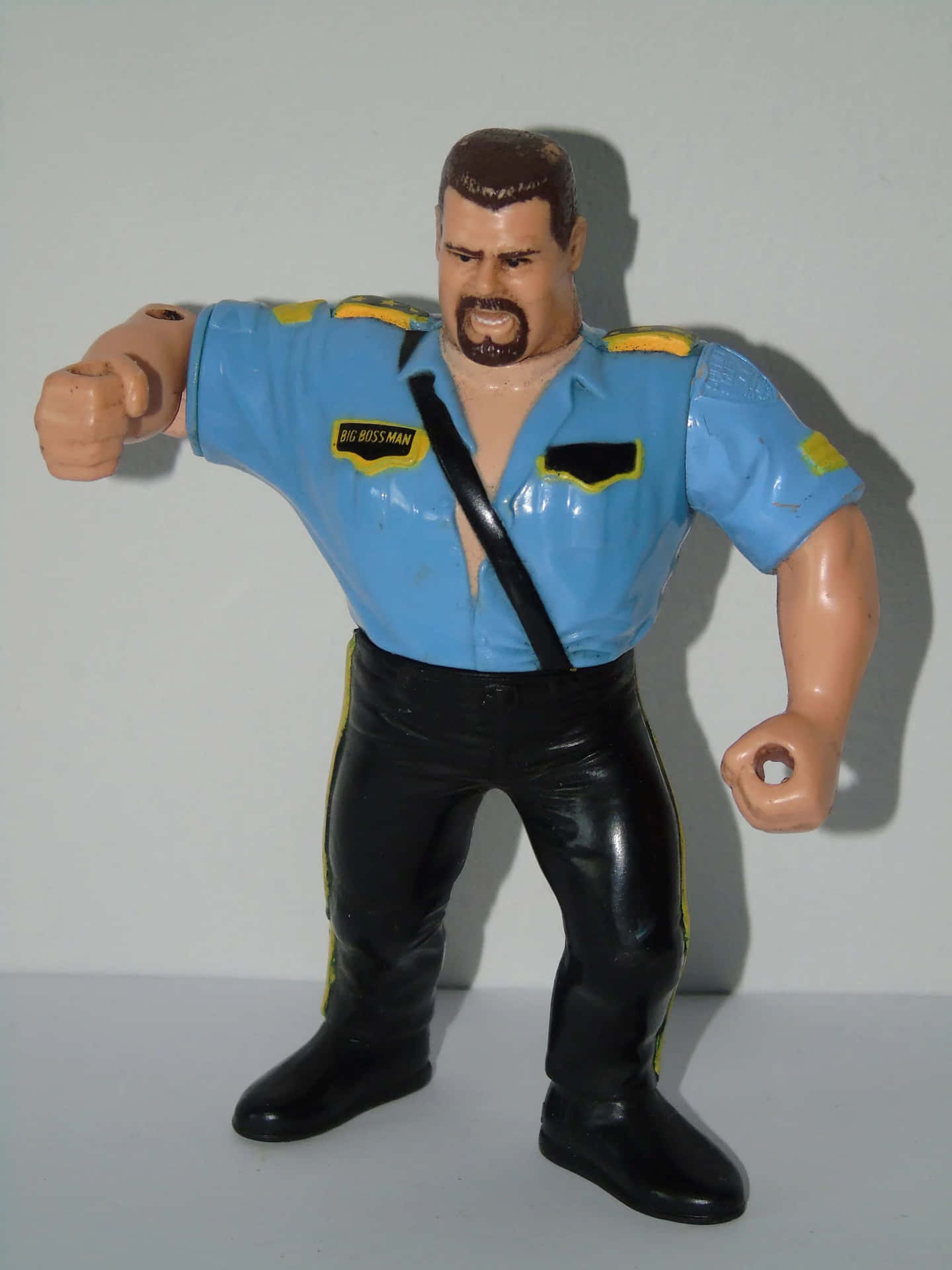 Big Boss Man Action Figure Background