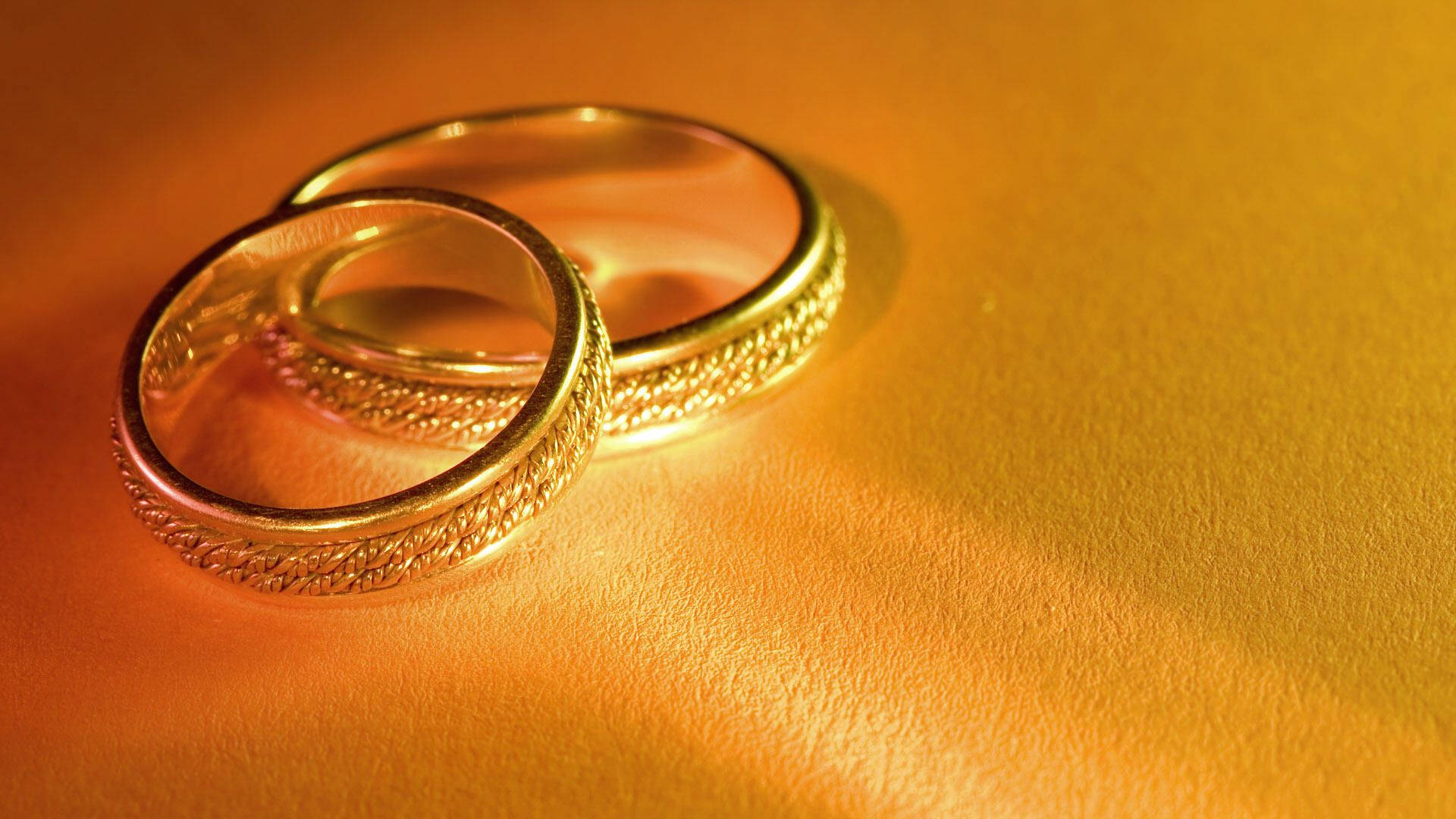 Big Gold Wedding Rings Background