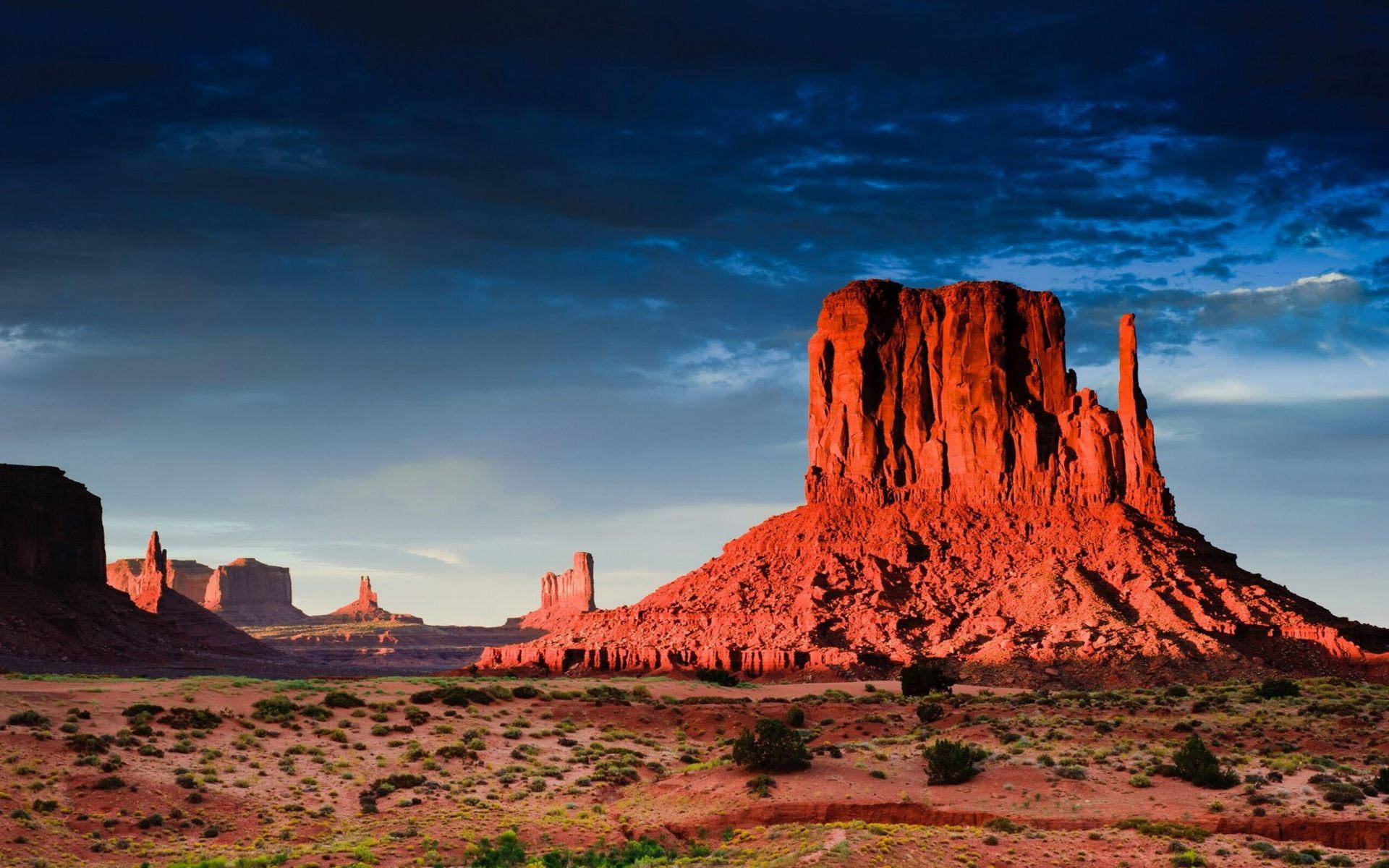 Big Red Rock At Monument Valley Background