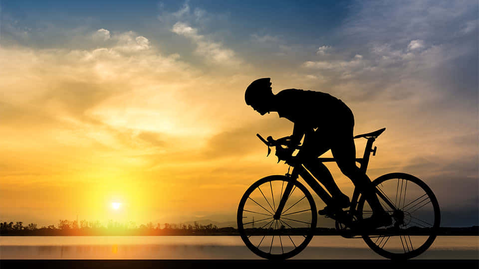 Bike Ride Through Sunrise Background