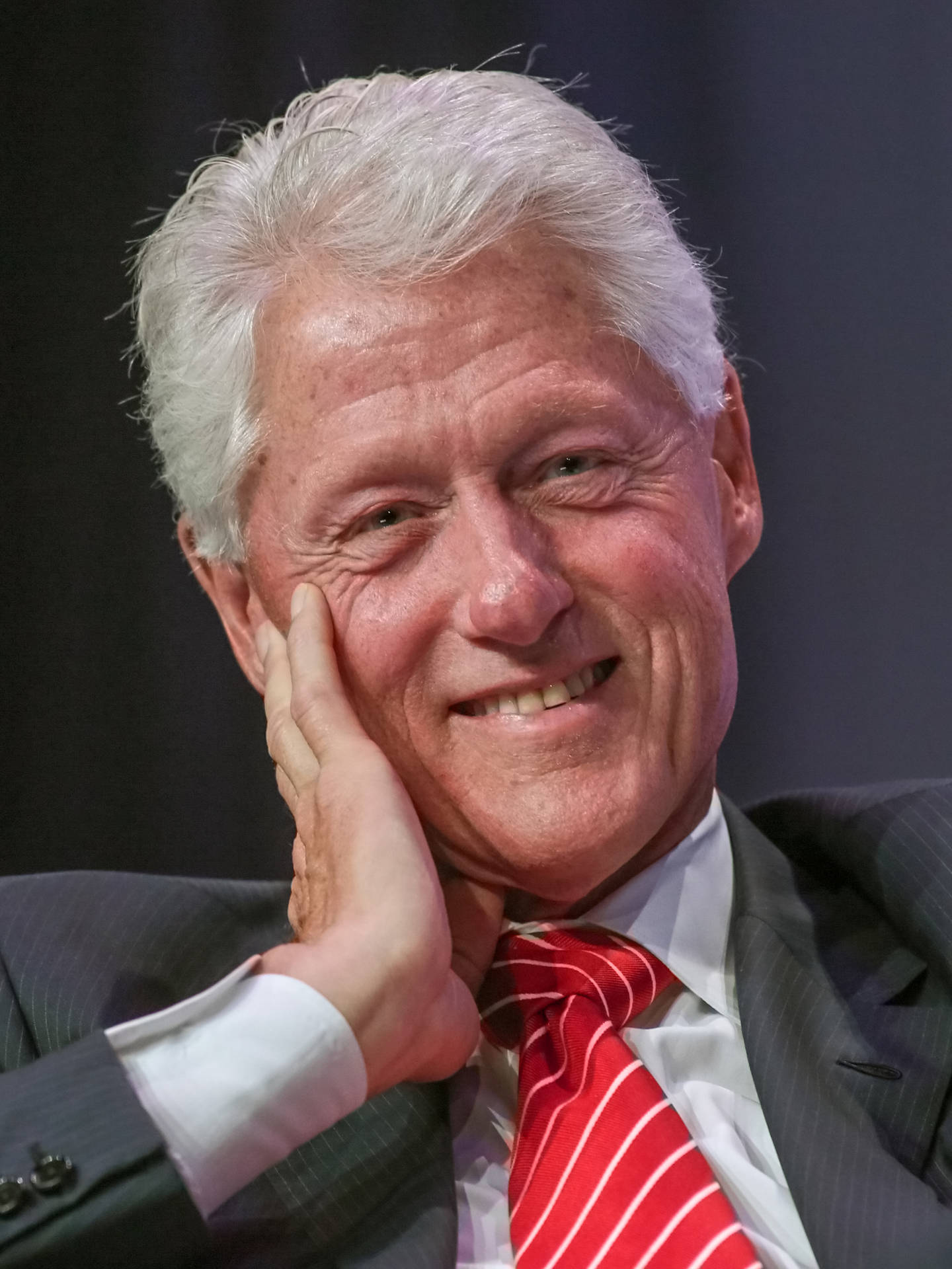 Bill Clinton Propping His Cheek Background