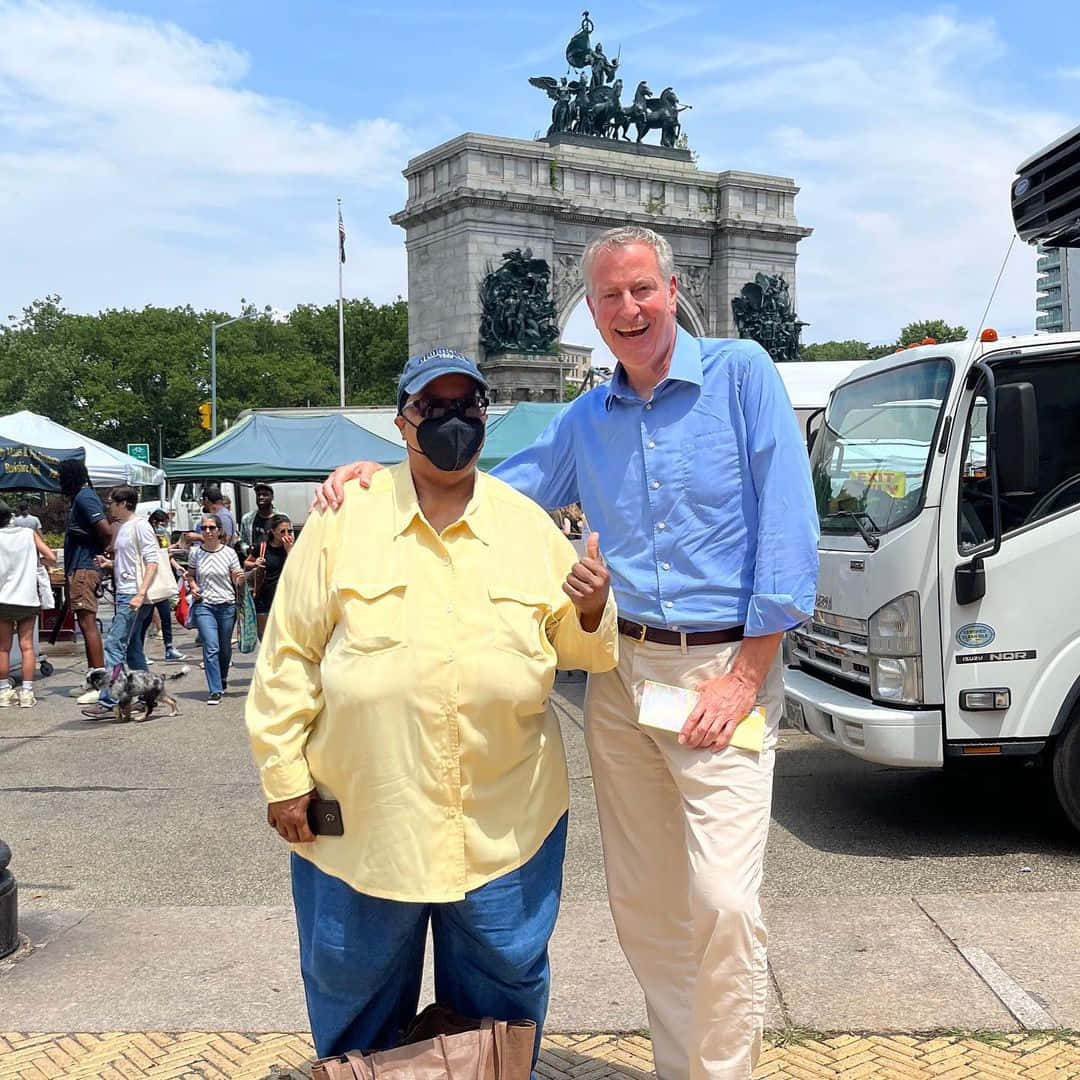 Bill De Blasio In A Busy Street Background