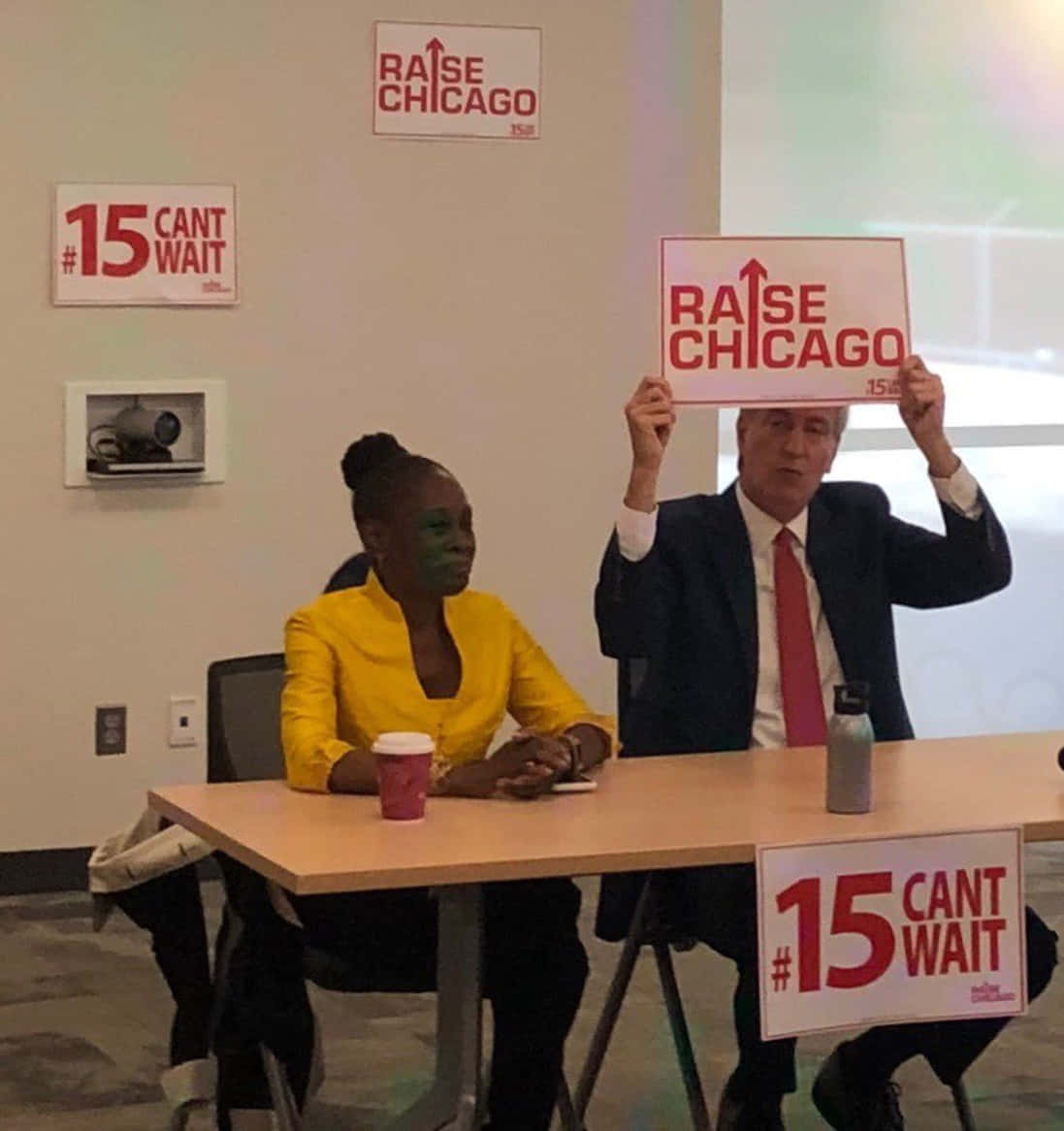 Bill De Blasio Raising A Sign